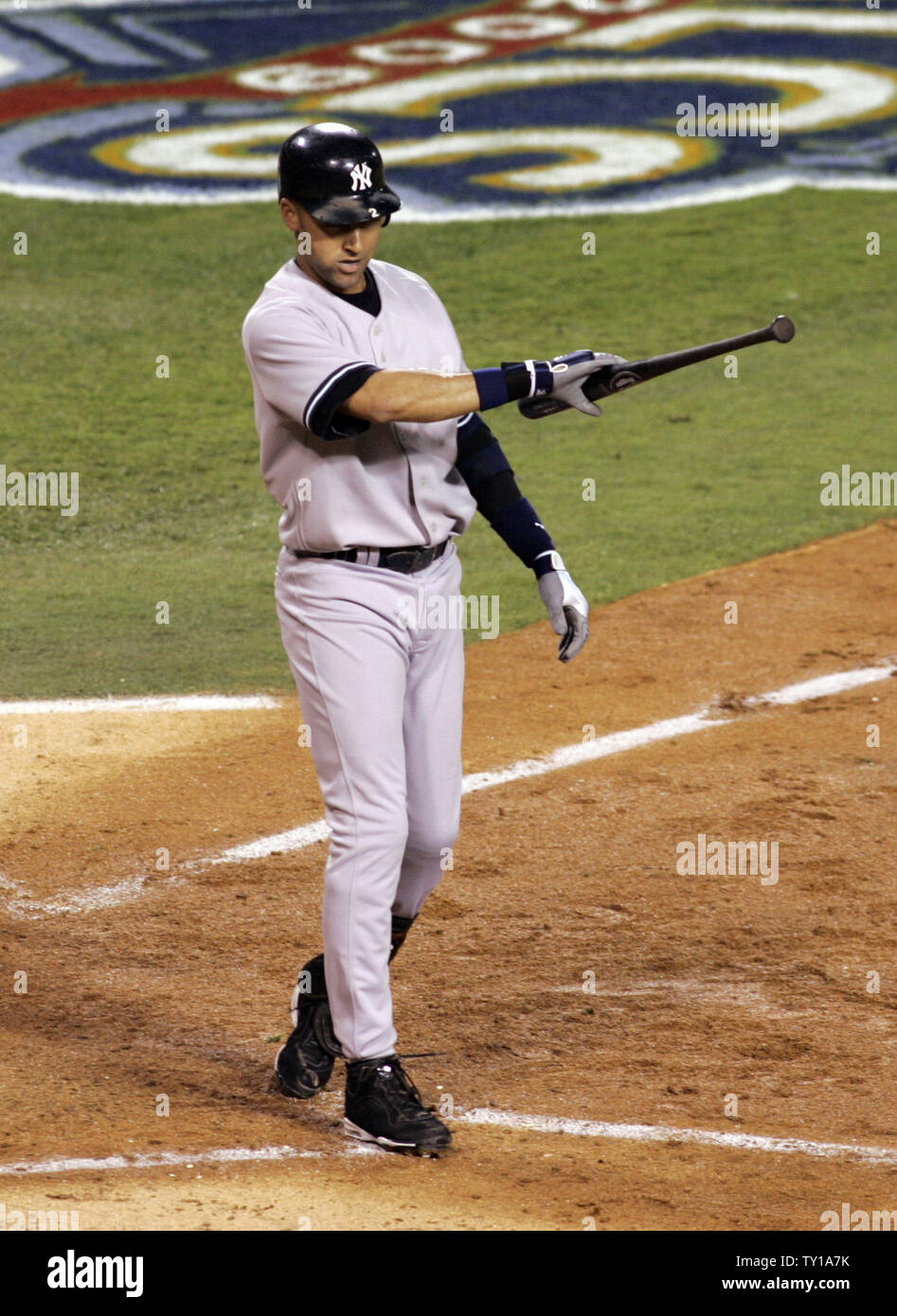 New York Yankees shortstop Derek Jeter strikes out against the Los