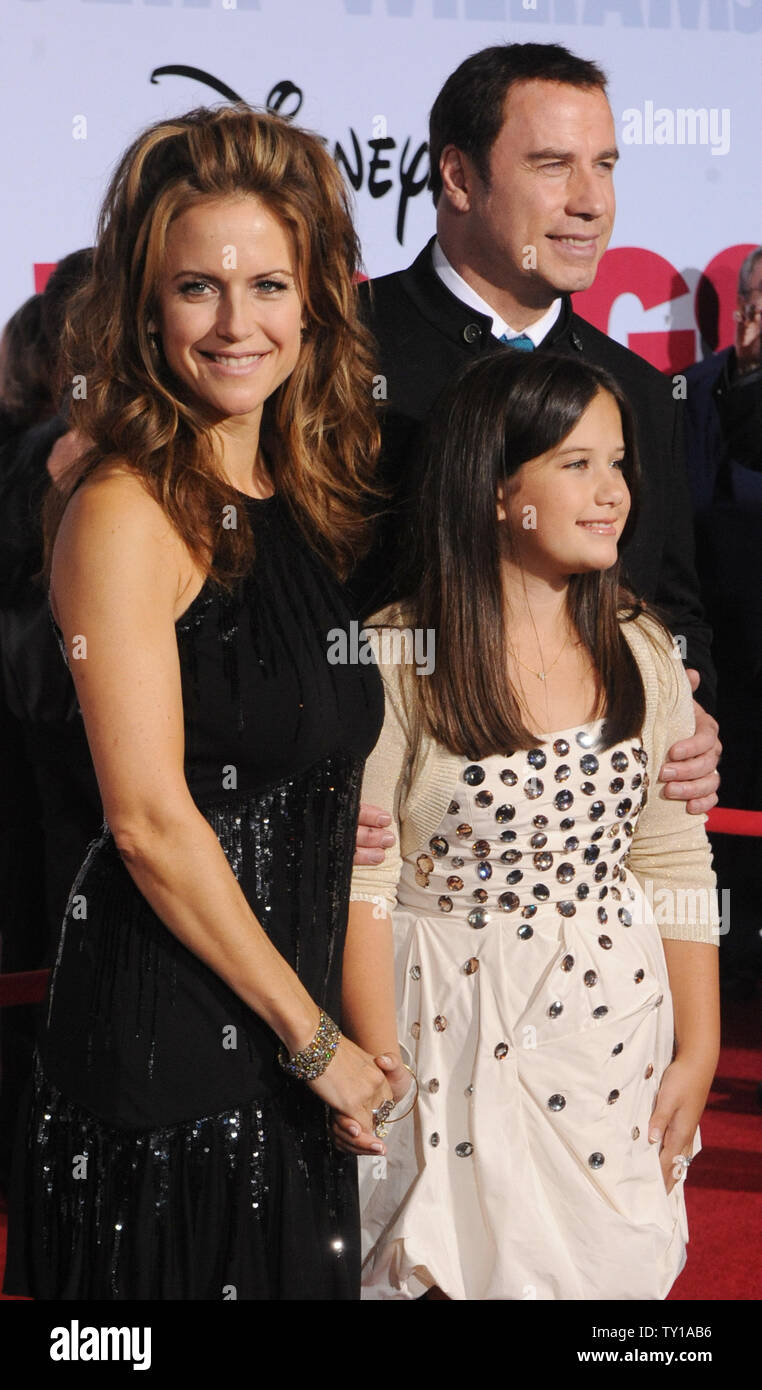 Actor John Travolta and wife Kelly Preston pose with their daughter Ella Bleu Travolta at the premiere of their new motion picture comedy 'Old Dogs', at the El Capitan Theatre in the Hollywood section of Los Angeles on November 9, 2009. All three star in the film with Robin Williams.     UPI/Jim Ruymen Stock Photo