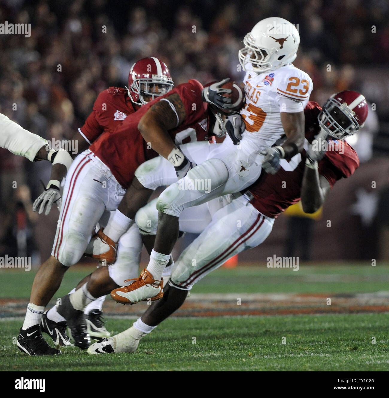 Texas Longhorns Running Back Tre Newton 23 Is Tackled By