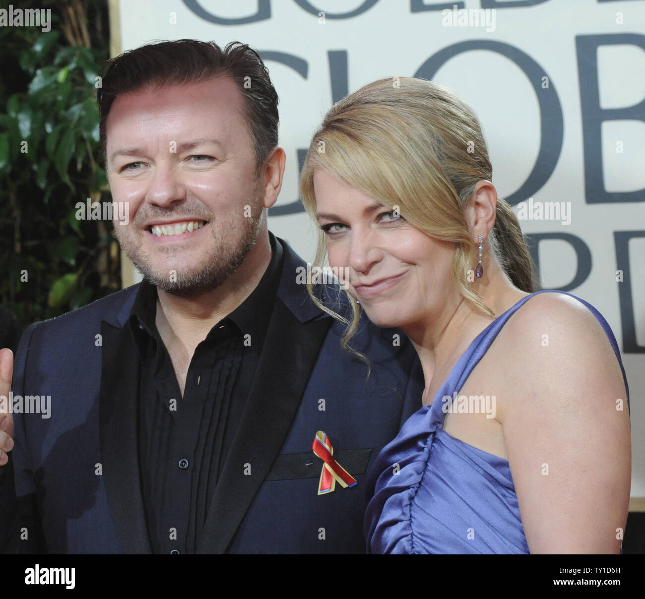Host Ricky Gervais and his wife Jane Fallon arrive at the 67th annual
