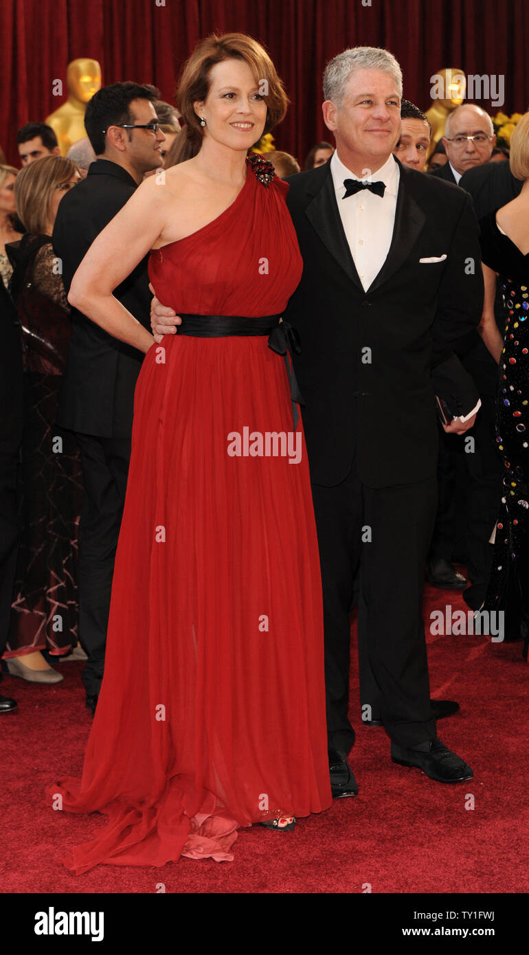 Actress Sigourney Weaver and her husband Jim Simpson arrive on the red