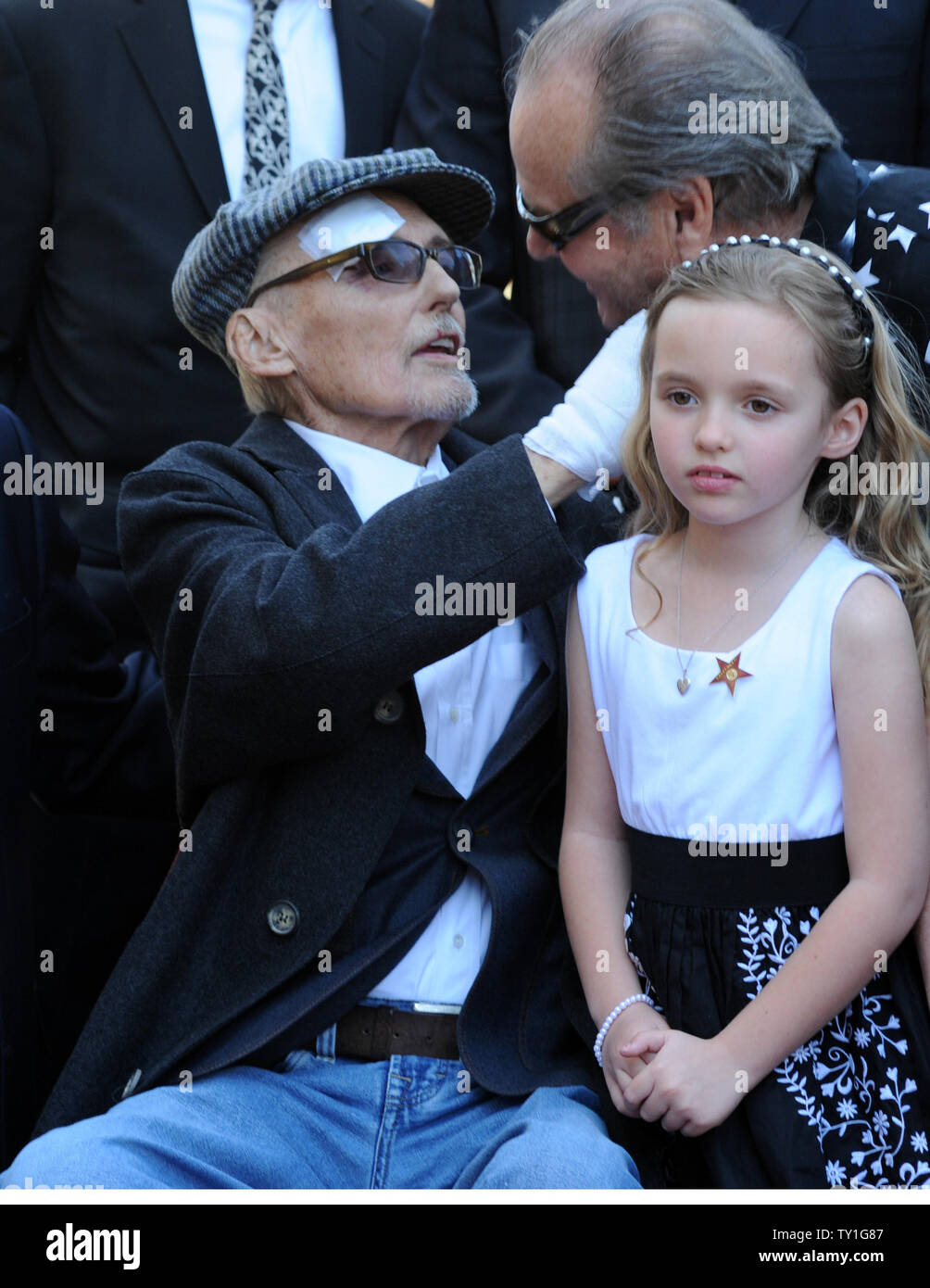 Actor Dennis Hopper (L) is greeted by actor Jack Nicholson, as his ...