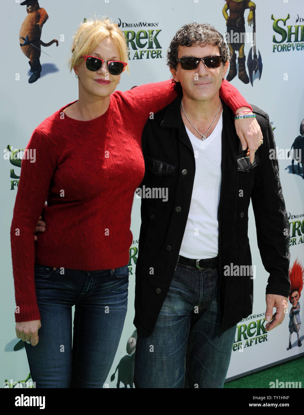 Spanish actor Antonio Banderas (R), the voice of Puss and Boots in the animated motion picture comedy 'Shrek Forever After', attends the premiere of the film with his wife, actress Melanie Griffith in Los Angeles on May 16, 2010.     UPI/Jim Ruymen Stock Photo