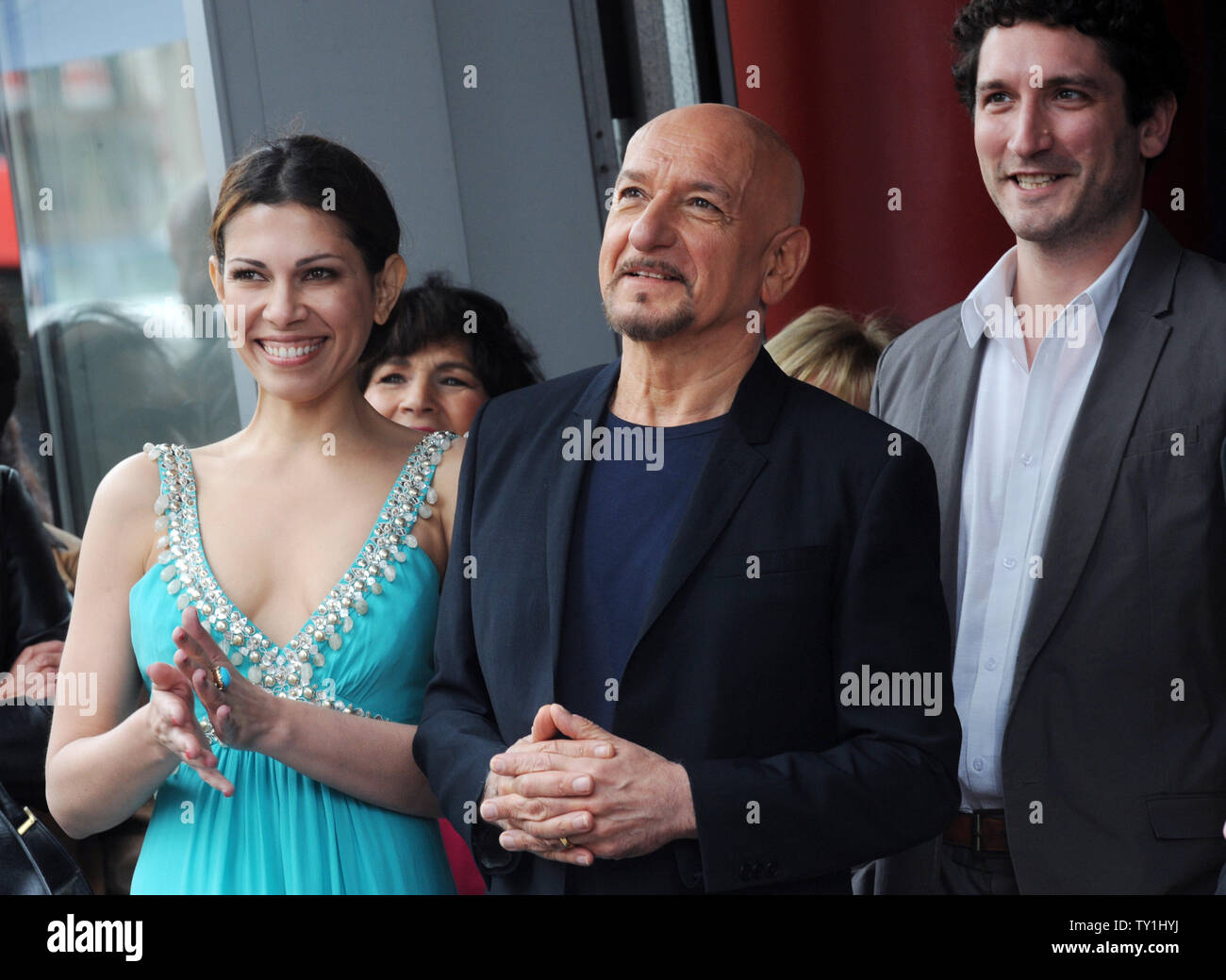 British actor Ben Kingsley (R) is joined by his wife, Brazilian actress