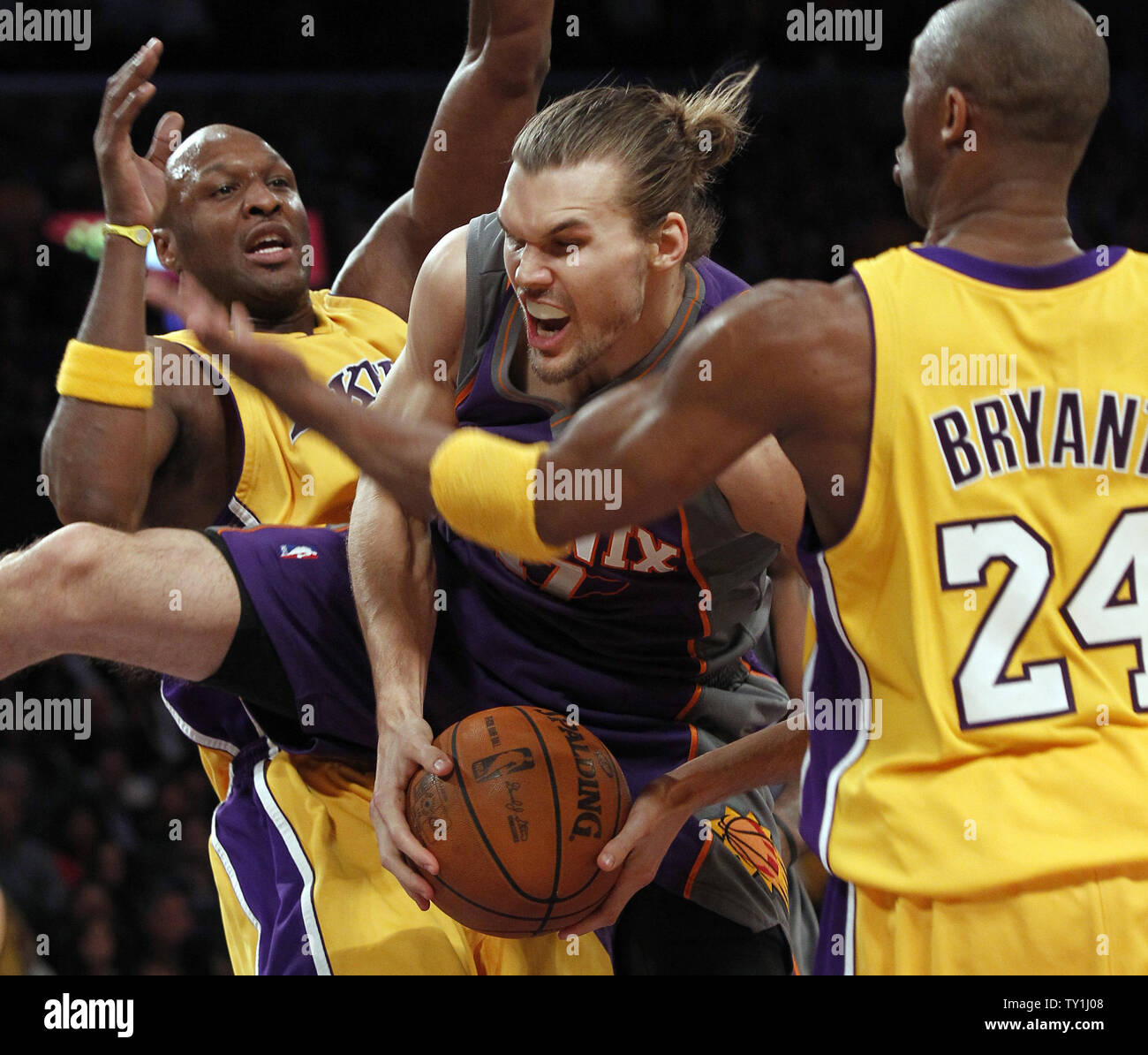 Los Angeles Lakers Lamar Odom Left And Kobe Bryant 24 Stop Phoenix Suns Center Louis Amundson Center During The First Half Of Game 5 Of Their Western Conference Final Series At Staples
