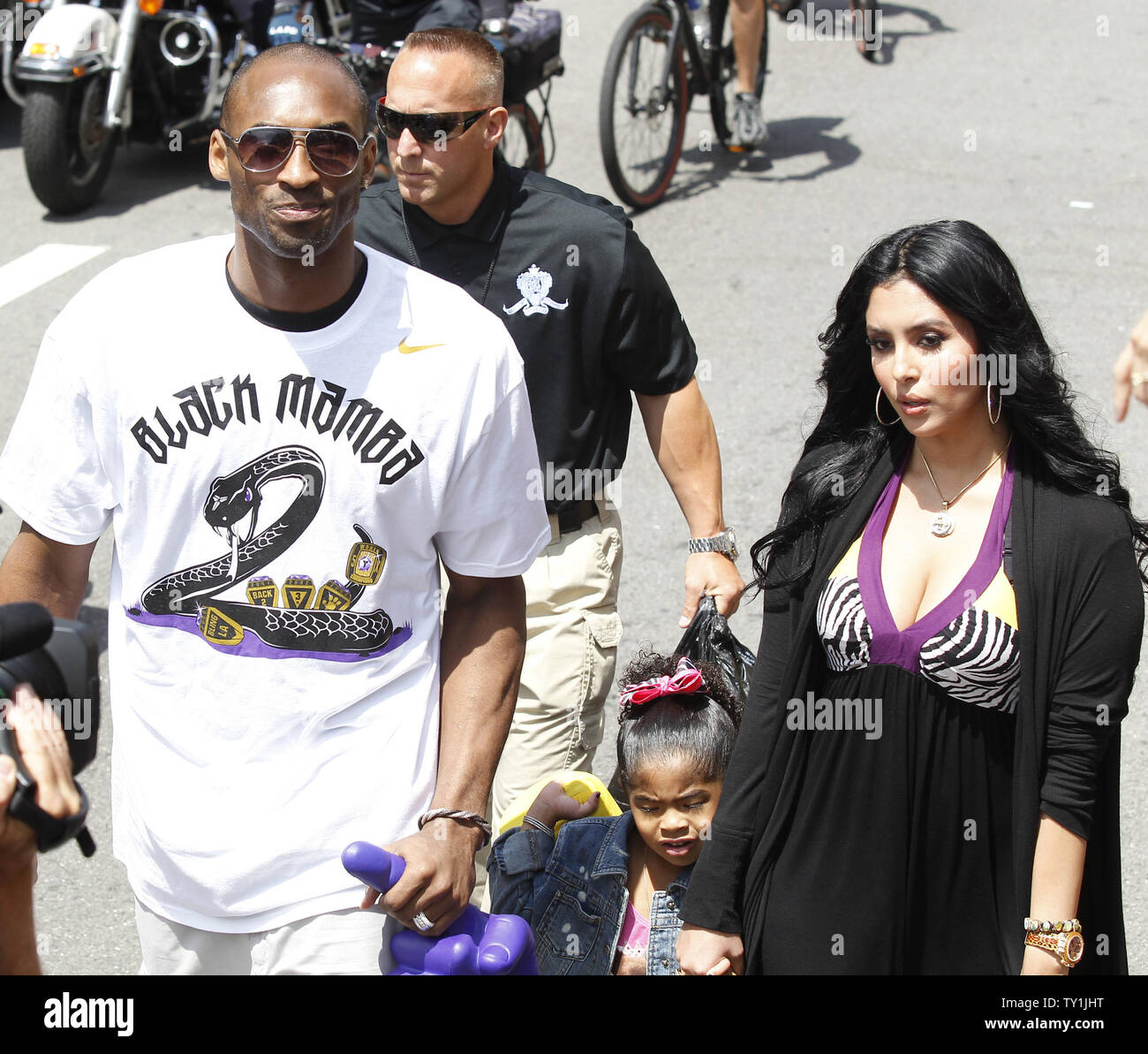 21 June 2010 - Los Angeles, California - 2010 NBA Finals MVP Kobe Bryant,  center, celebrates his fifth NBA championship with the Los Angeles Lakers  during a victory parade for the Lakers