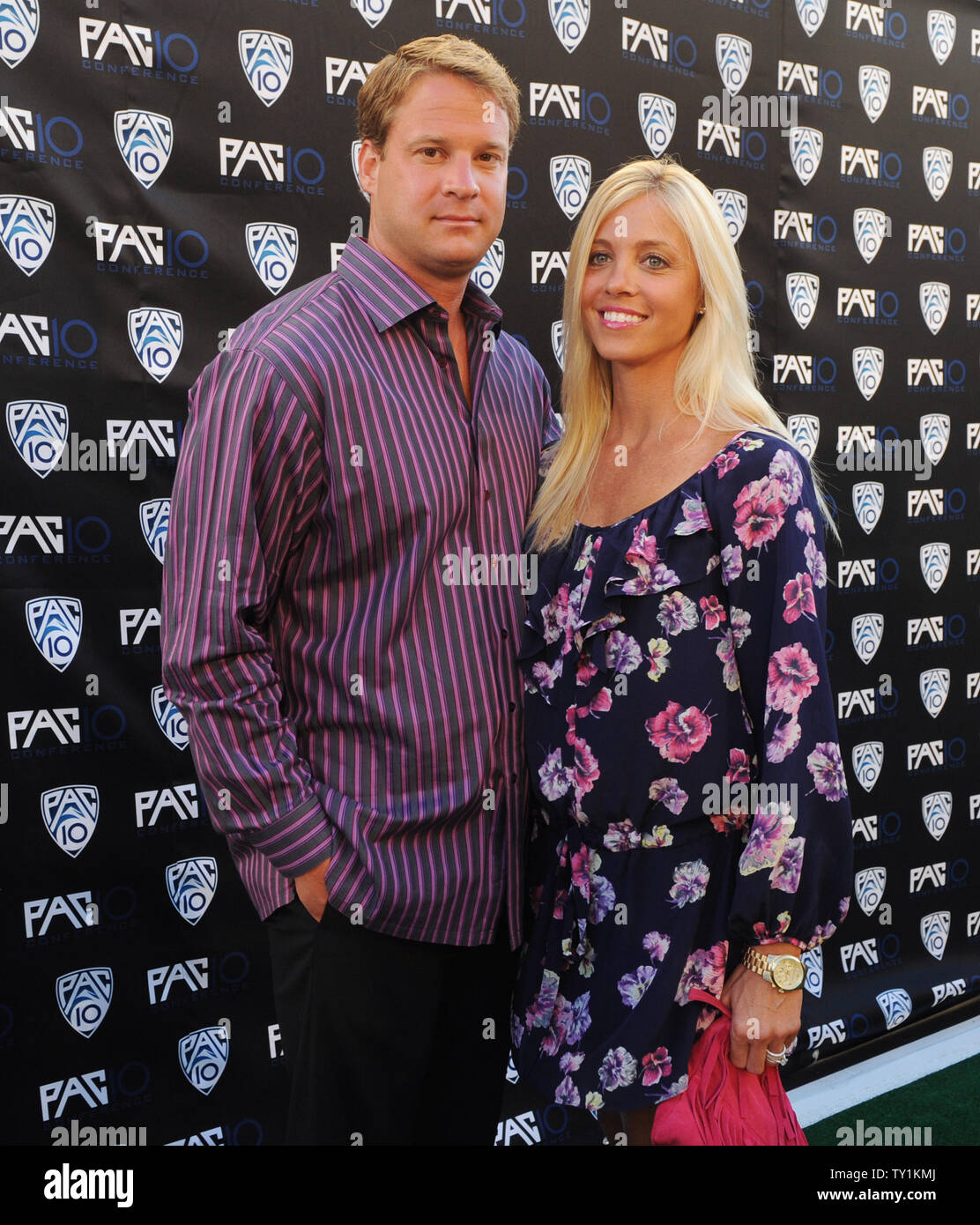 USC head football coach Lane Kiffin (L) and wife Layla Kiffin attend