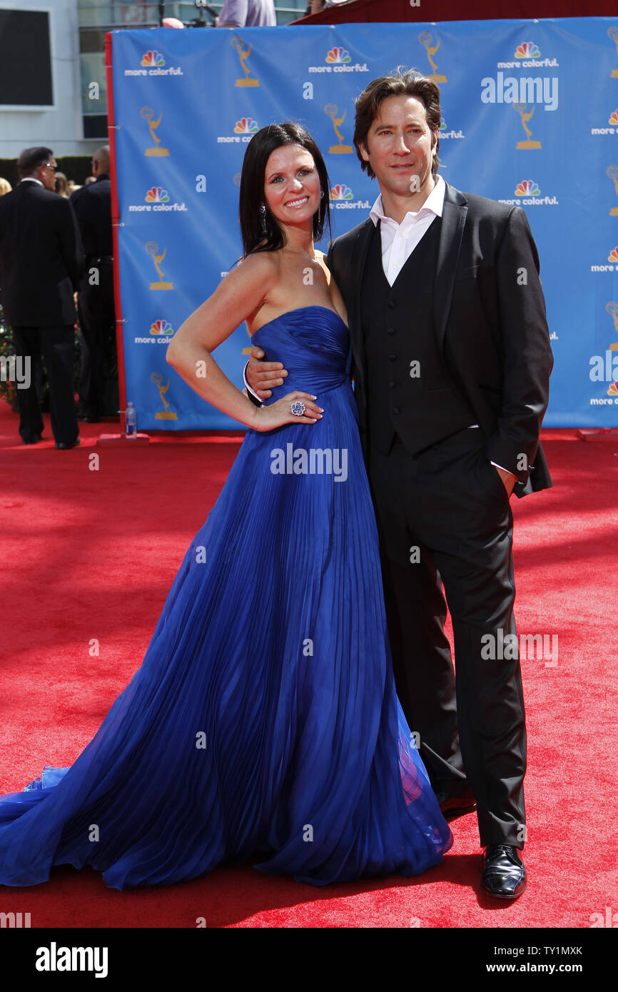 Henry Ian Cusick and his wife Annie arrive at the 62nd Primetime Emmy Awards at the Nokia Theatre in Los Angeles on August 29, 2010.    UPI/Lori Shepler Stock Photo