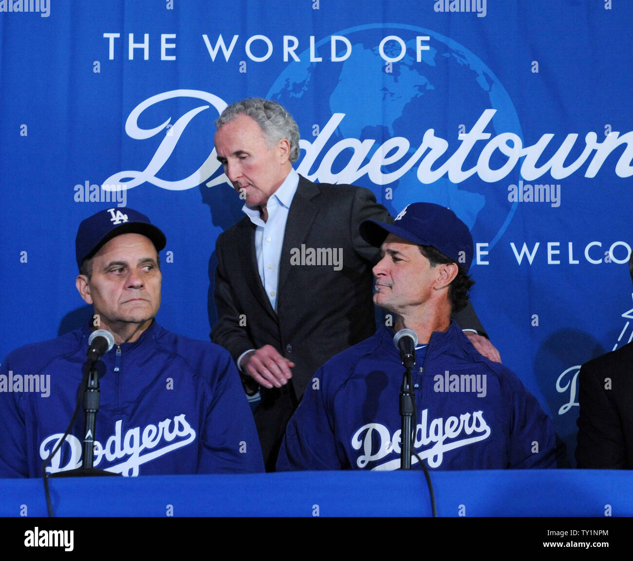Los Angeles Dodgers Owner Frank Mccourt C Congratulates Hitting