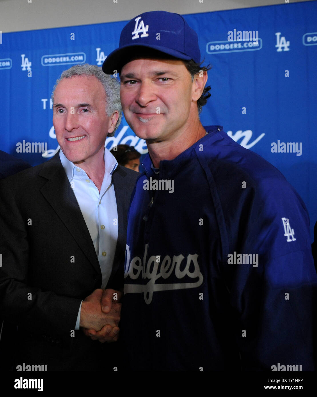 Los Angeles Dodgers Owner Frank Mccourt L Shakes Hands With