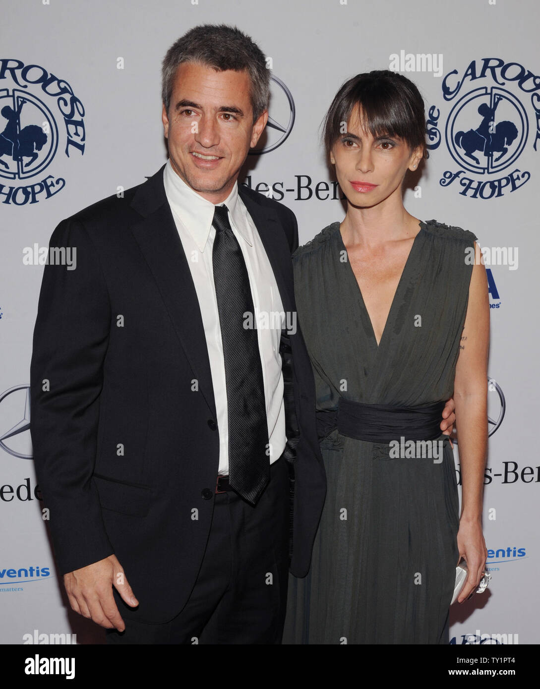 Actor Dermott Mulroney and a guest arrive at the 32nd anniversary Carousel of Hope Ball in Beverly Hills, California on October 23, 2010. The ball benefits The Barbara Davis Center for Childhood Diabetes.   UPI/Jim Ruymen Stock Photo
