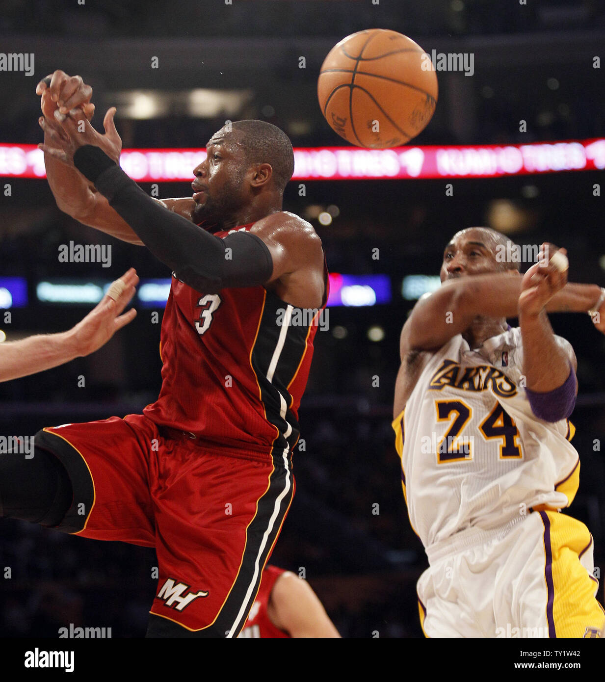 Los Angeles Lakers shooting guard Kobe Bryant (24) blocks Miami Heat shooting guard Dwyane Wade (3) in the first half of  their NBA basketball game in Los Angeles on December  25, 2010.   UPI/Lori Shepler Stock Photo