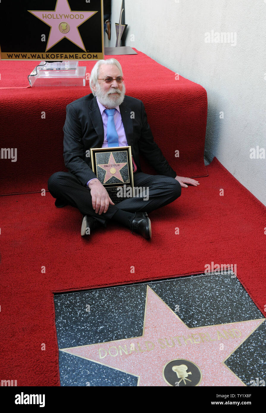 Canadian Actor Donald Sutherland Sits Near His Star During An Unveiling   Canadian Actor Donald Sutherland Sits Near His Star During An Unveiling Ceremony Honoring Him With The 2430th Star On The Hollywood Walk Of Fame In Los Angeles On January 26 2011 Sutherlands Star Is Set Next To That Of His Son Actor Kiefer Sutherland Upijim Ruymen TY1X8F 