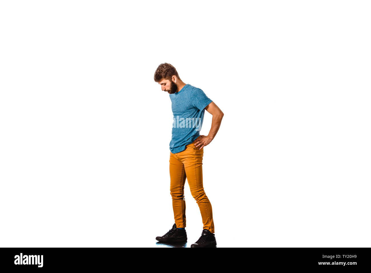 Amazing dancer is doing breakdance on a white background Stock Photo