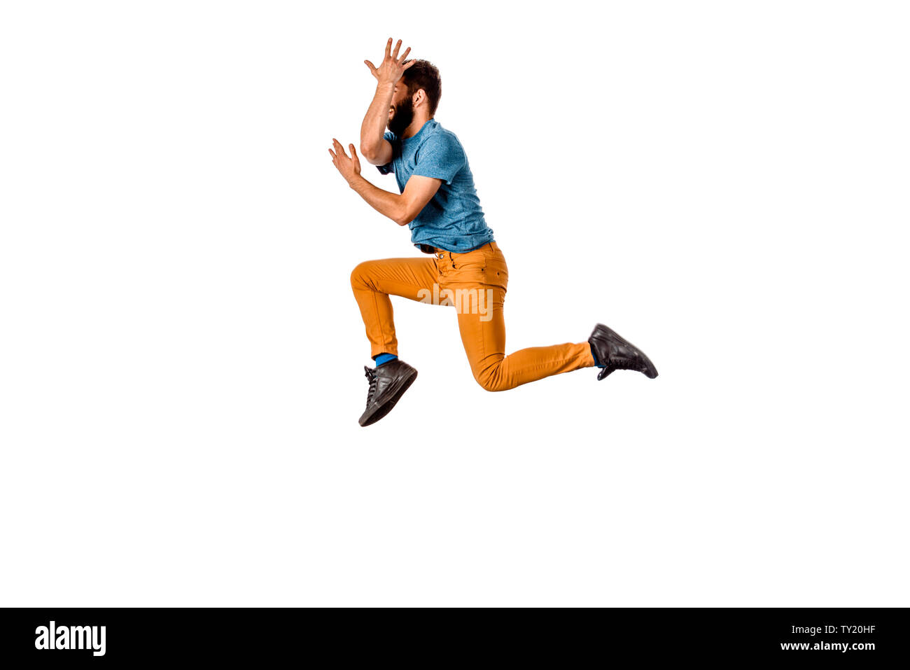 Amazing dancer is doing breakdance on a white background Stock Photo