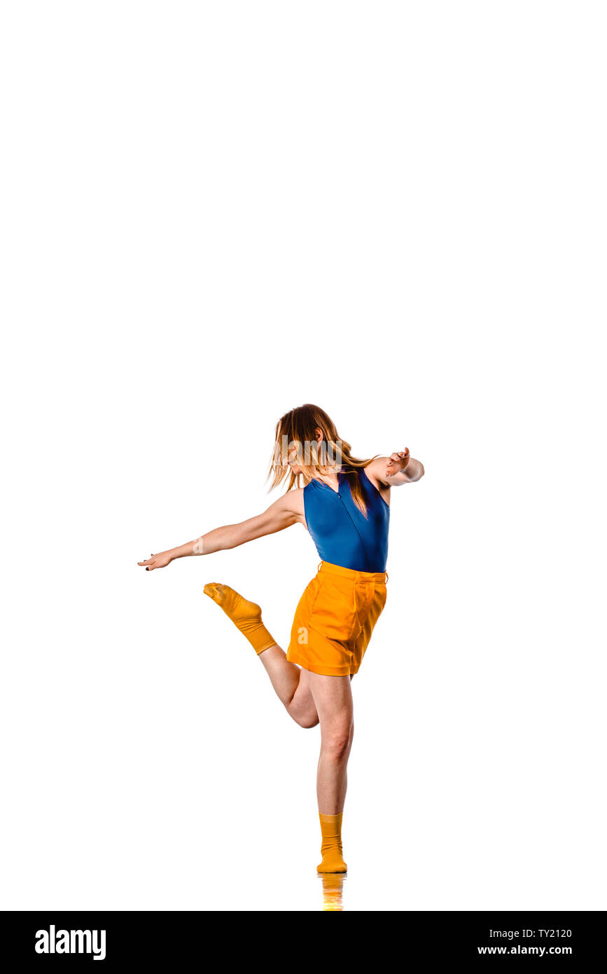 Amazing dancer is doing breakdance on a white background Stock Photo
