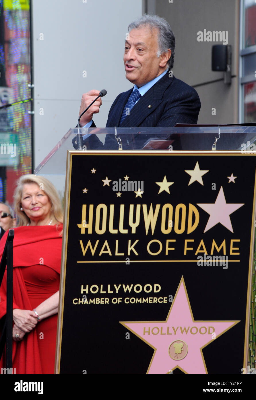 International orchestral and operatic conductor Zubin Mehta makes comments as his wife Nancy looks on during ceremonies honoring Mehta with the 2,434th star on the Hollywood Walk of Fame in Los Angeles on March 1, 2011. Members of the Los Angeles, Israel and Vienna Philharmonic Orchestras performed a finale at the conlusion of the event.  UPI/Jim Ruymen Stock Photo