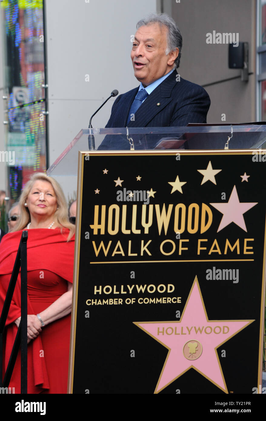 International orchestral and operatic conductor Zubin Mehta makes comments as his wife Nancy looks on during ceremonies honoring Mehta with the 2,434th star on the Hollywood Walk of Fame in Los Angeles on March 1, 2011. Members of the Los Angeles, Israel and Vienna Philharmonic Orchestras performed a finale at the conlusion of the event.  UPI/Jim Ruymen Stock Photo