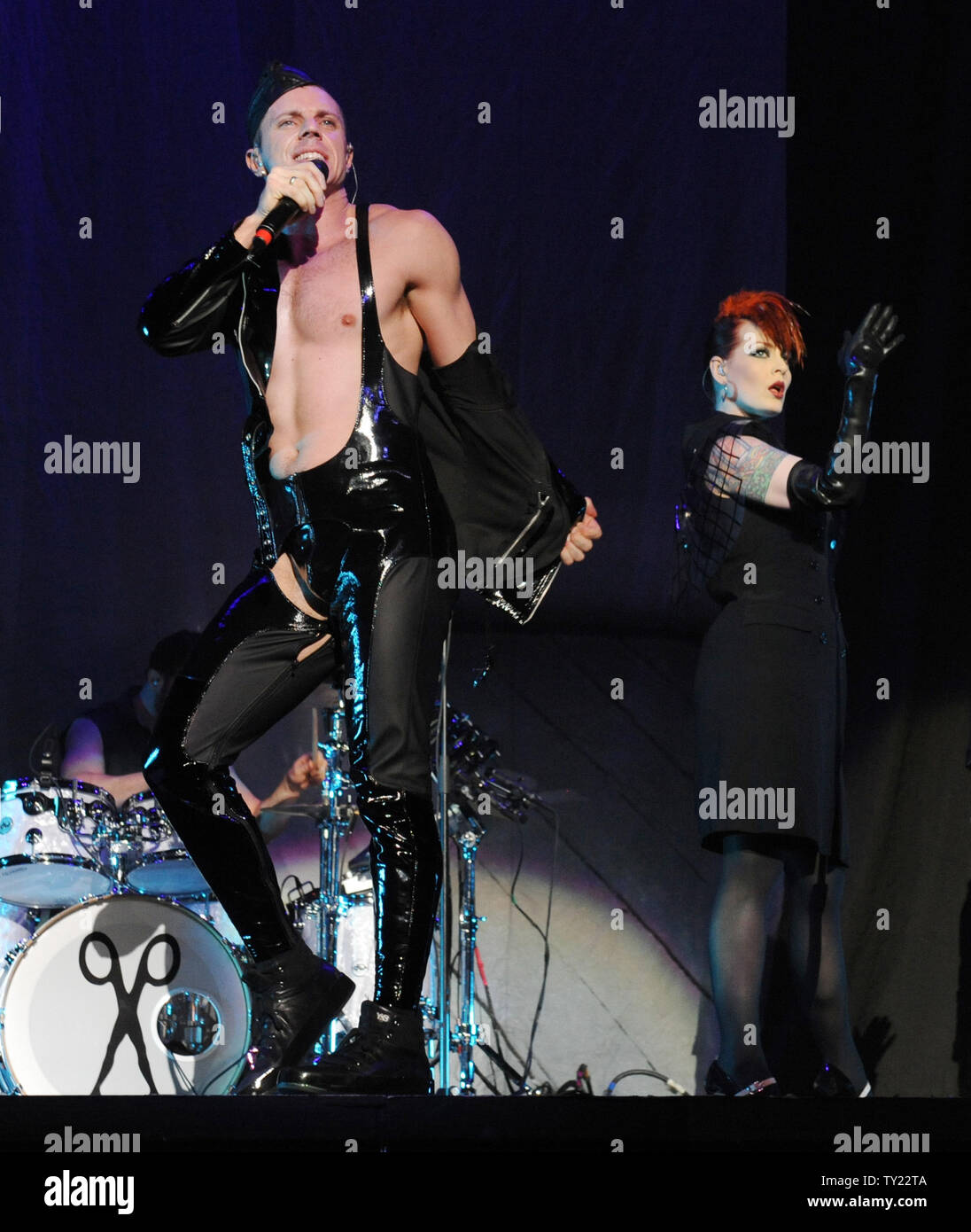 Singers Jake Shears (L) and Ana Matronic of the singing duo Scissor
