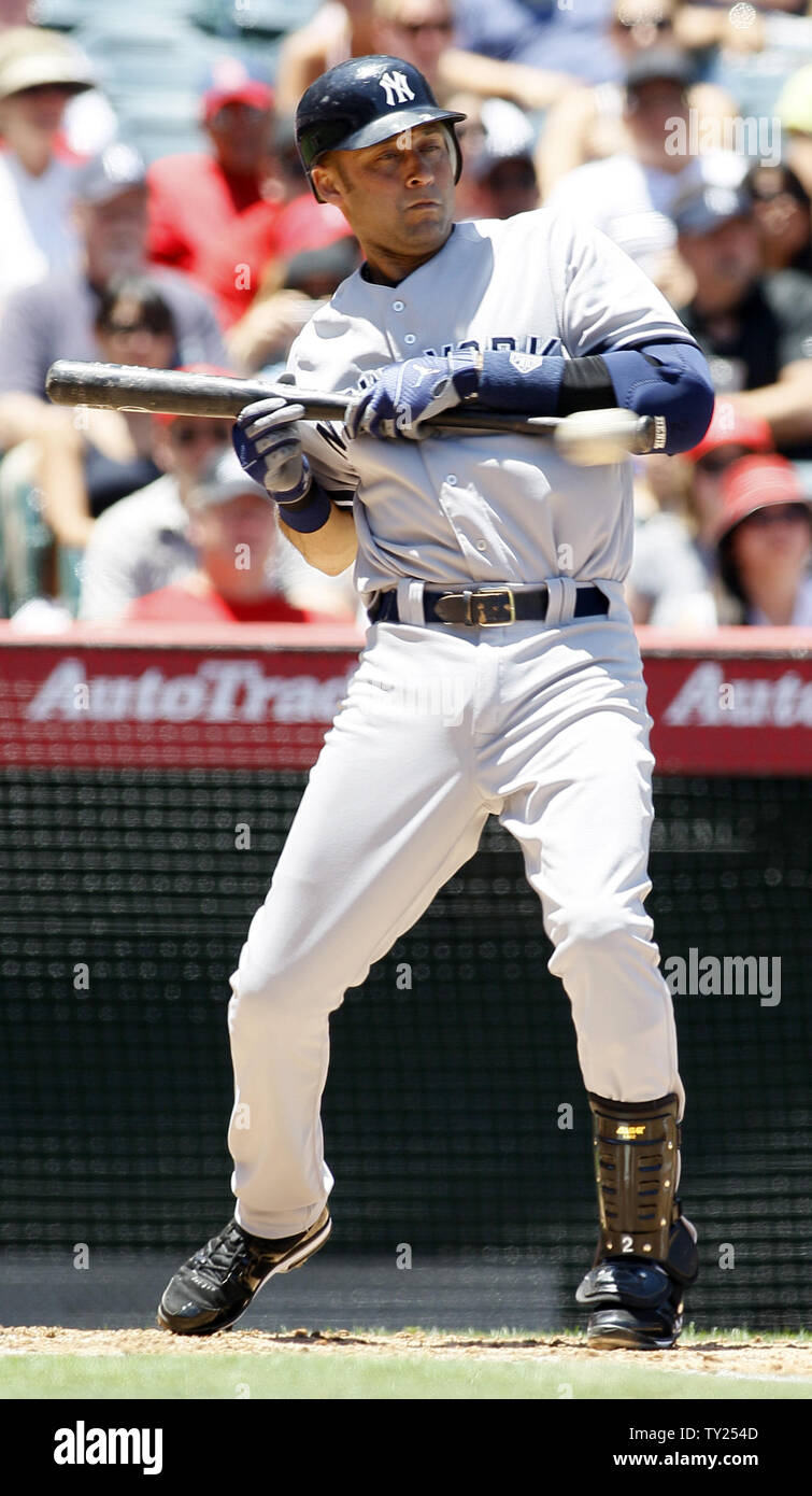 New York Yankees' Derek Jeter (2) is almost hit by a pitch by Los