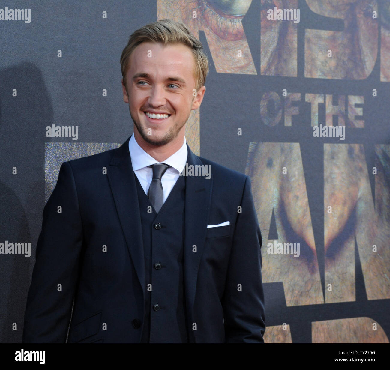 Tom Felton, a cast member in the motion picture sci-fi thriller "Rise of  the Planet of the Apes", arrives for the premiere of the film at Grauman's  Chinese Theatre in Los Angeles
