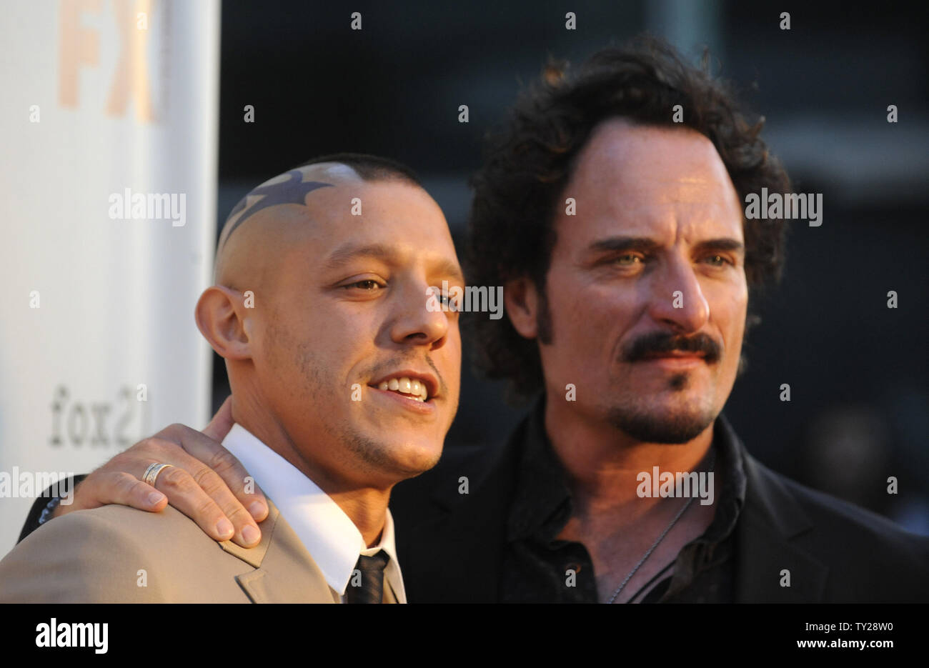 Cast members Theo Rossi (L) and Kim Coates attend the Sons of Anarchy, Season 4 premiere screening at the Arclight Theatre in the Hollywood section of Los Angeles on August 30, 2011.      UPI/Phil McCarten Stock Photo