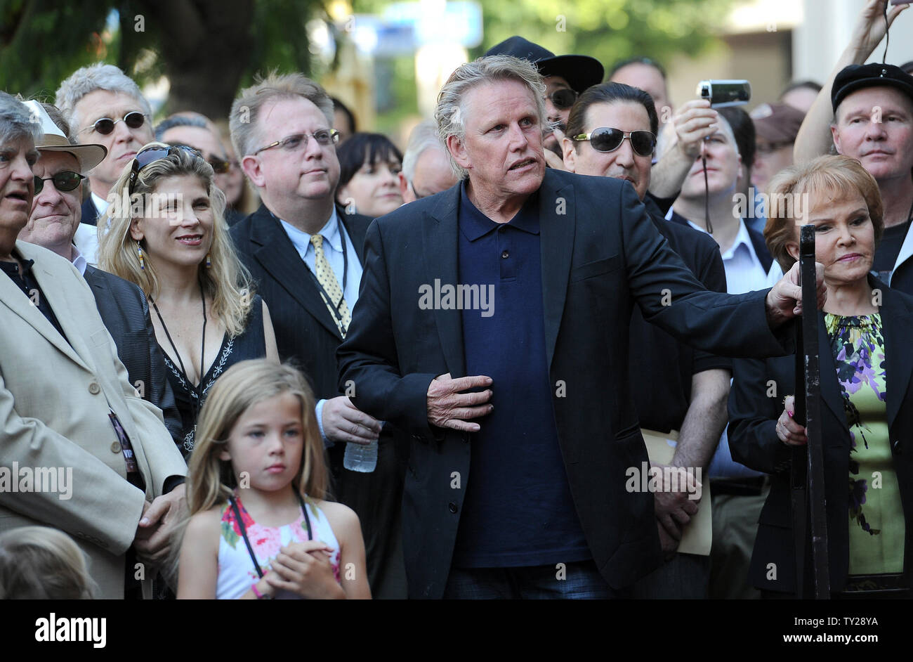 The late Buddy Holly received a posthumous star on Hollywood's Walk of Fame on his 75th birthday on Vine Street in front of The Capitol Records Building in Los Angeles on September 7, 2011. L-R; John Phil Everly, Stephanie and Gary Busey and Maria Elena Holly wait for their turn to speak at the event.  UPI/Jayne Kamin-Oncea Stock Photo