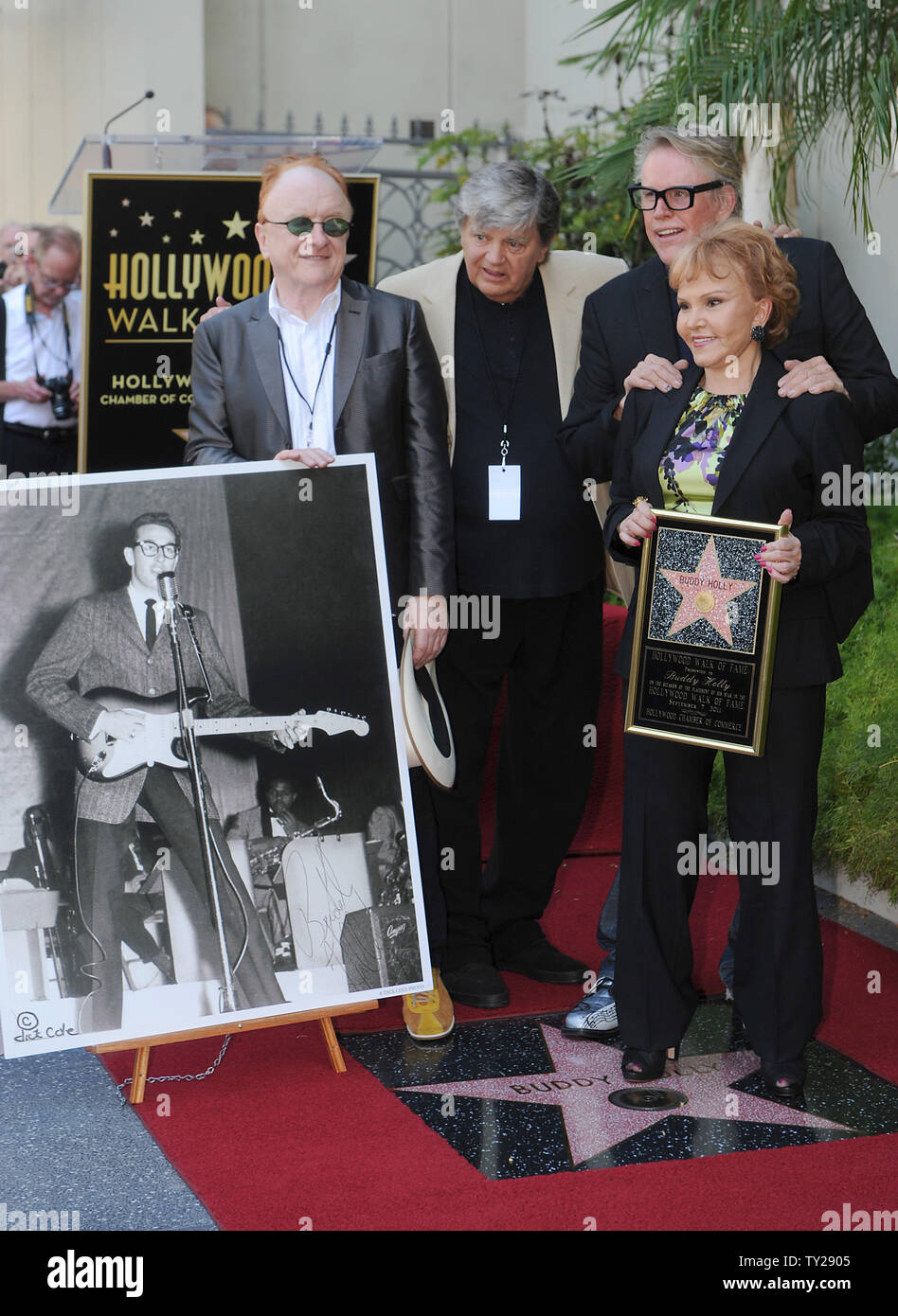 The late Buddy Holly receives a posthumous Walk of Fame Star on his 75th birthday on Vine Street in front of The Capitol Records Building, in Los Angeles on September 7, 2011.  L-R; John Asher, Phil Everly, Gary Busey and Maria Elena Holly in front of Buddy Holly's star.   UPI/Jayne Kamin-Oncea Stock Photo