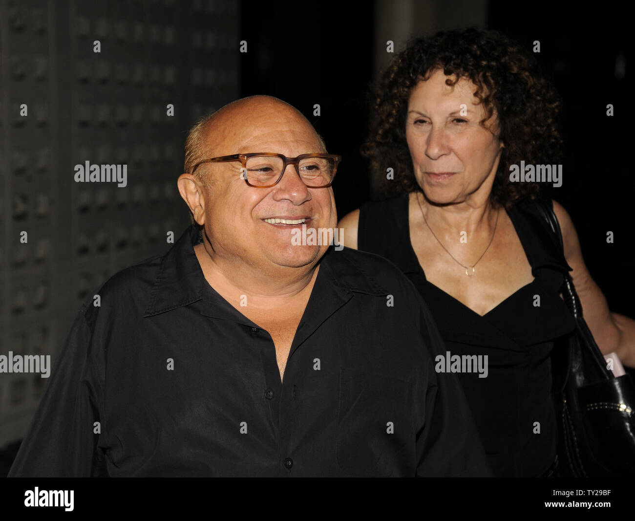 Cast member Danny DeVito and wife Rhea Perlman attend the Premiere Screening of FX’s 'It’s Always Sunny in Philadelphia' season seven and 'The League' season three at the Cinerama Dome in the Hollywood section of Los Angeles on September 13, 2011.      UPI/Phil McCarten Stock Photo