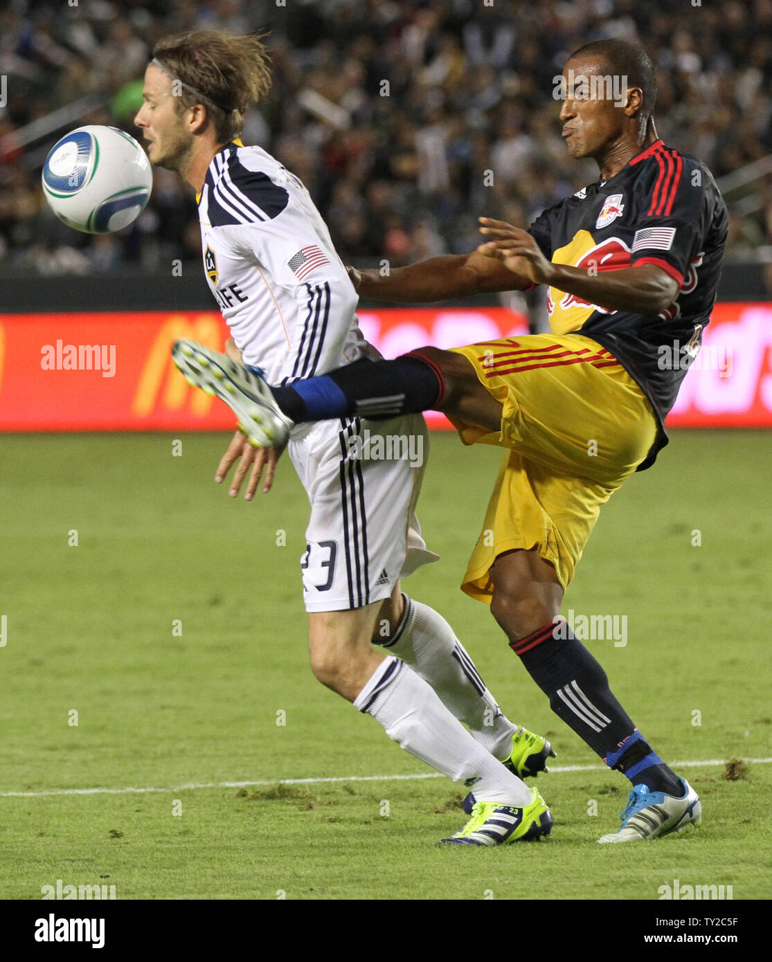 Los Angeles Galaxy midfielder David Beckham (23) is kicked in the face by New York Red Bulls defender Roy Miller in the second half in the MLS Western Conference Semifinals game at the Home Depot Center in Carson, California on Nov. 3, 2011. Miller was called for a foul and Landon Donovan kicked a penalty goal on the next play. The Galaxy won 2-1. UPI/Lori Shepler. Stock Photo