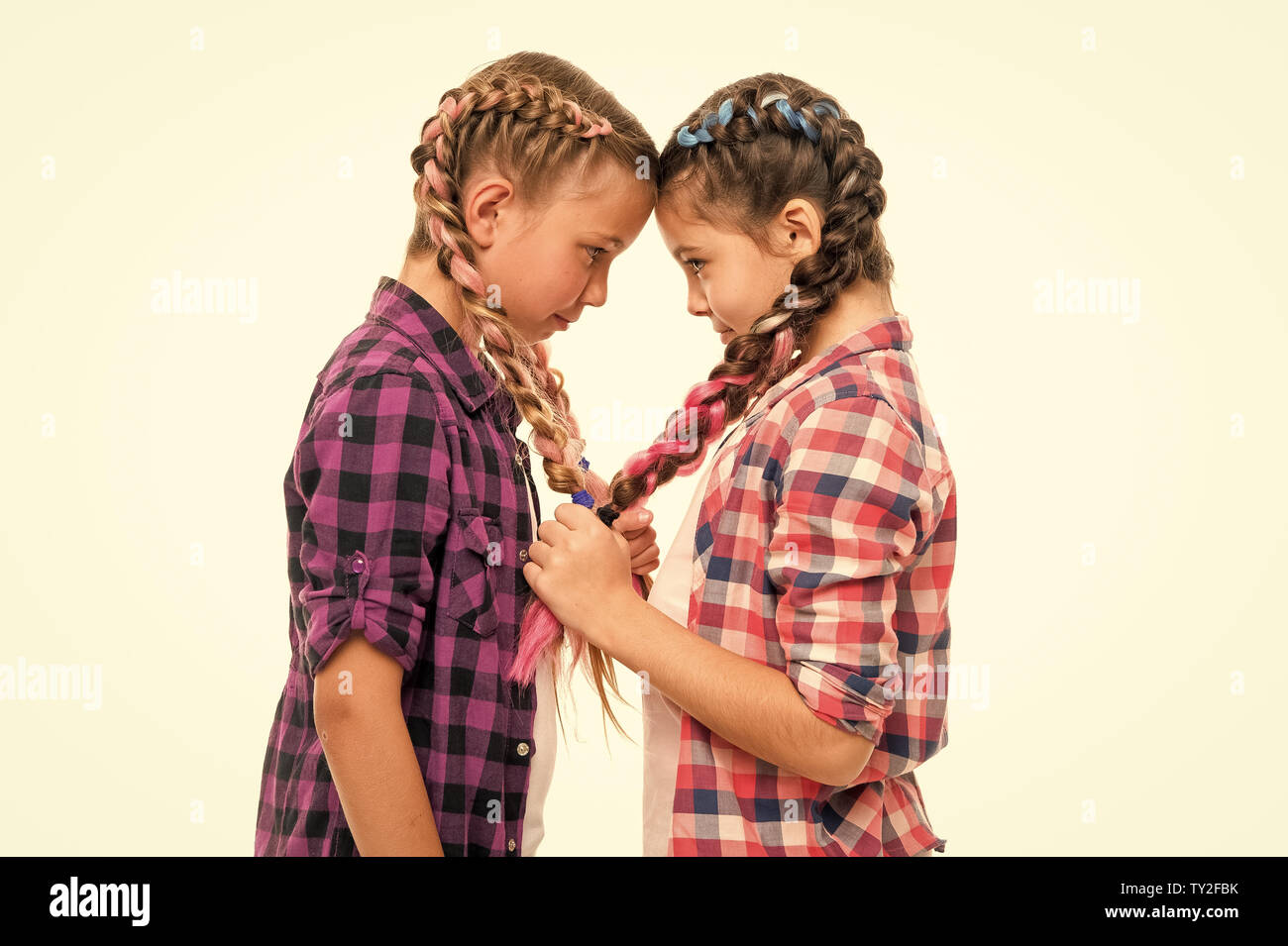 Girls Friends Similar Hairstyle Braids White Background Sisters
