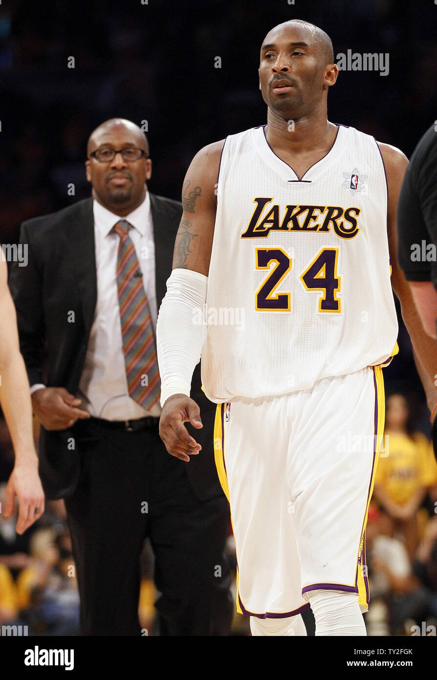 Los Angeles Lakers shooting guard Kobe Bryant (24) walks off the court with coach Mike Brown in  their NBA basketball game against the Chicago Bulls in Los Angeles on December 25, 2011. The Bulls won 88 to 87.   UPI/Lori Shepler Stock Photo