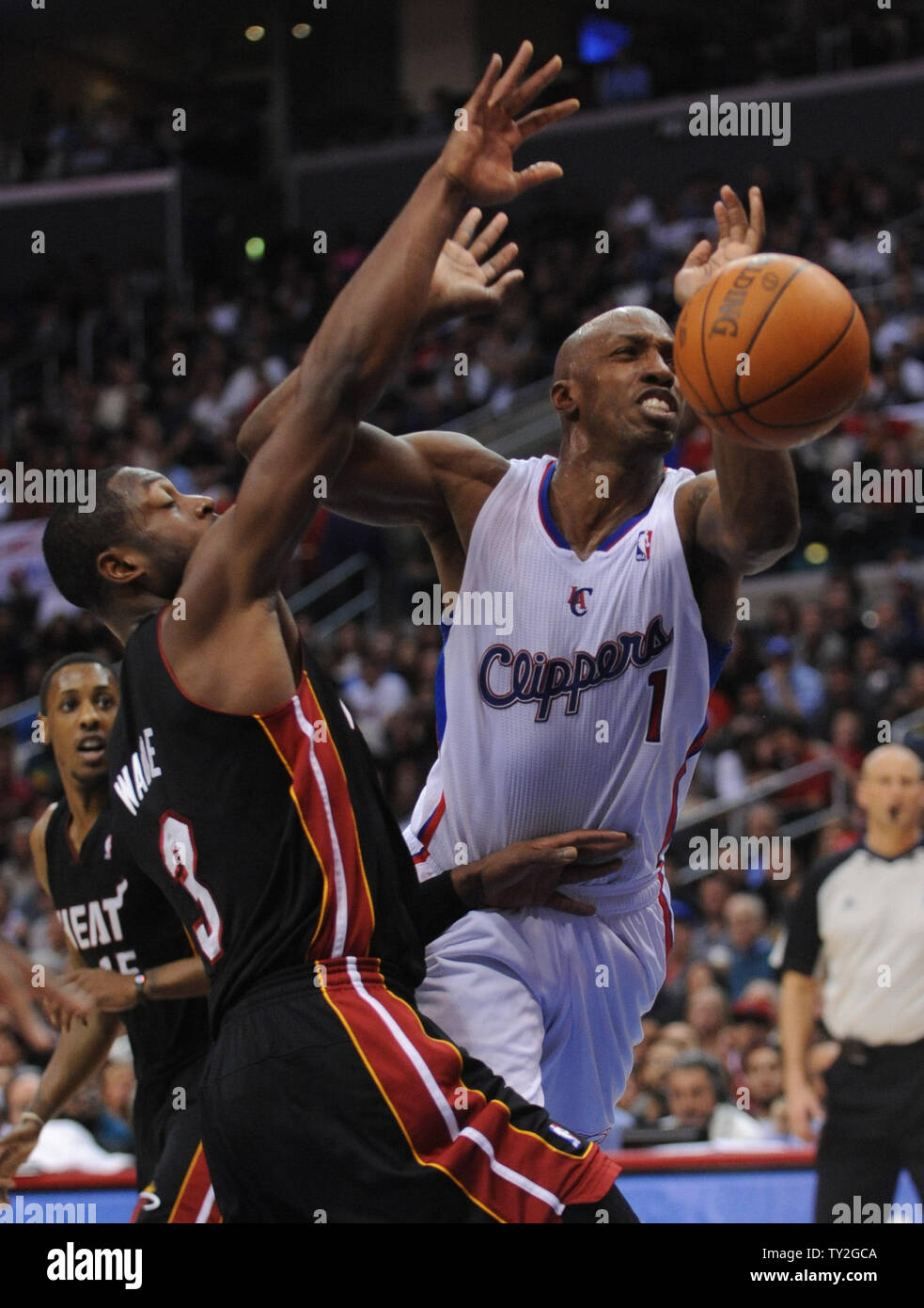 Los Angeles Clippers guard Chauncey Billups (1) is fouled by Miami Heat shooting guard Dwyane Wade (3) in the second half of  their NBA basketball game in Los Angeles on January 11, 2012.  The Clippers won 95-89.  UPI/Lori Shepler Stock Photo