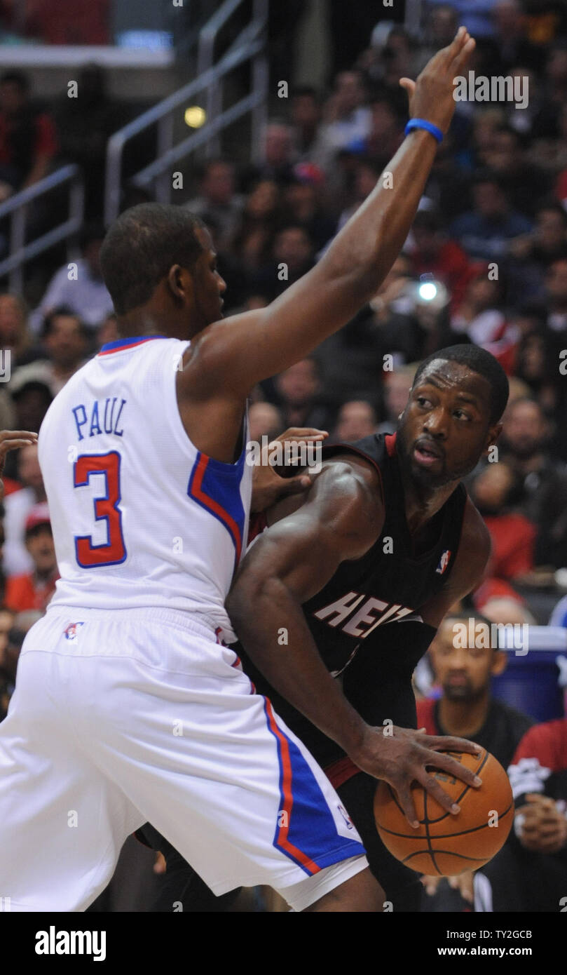 Los Angeles Clippers point guard Chris Paul (3) plays tight defense on Miami Heat shooting guard Dwyane Wade (3) in the first half of  their NBA basketball game in Los Angeles on January 11, 2012.    UPI/Lori Shepler Stock Photo