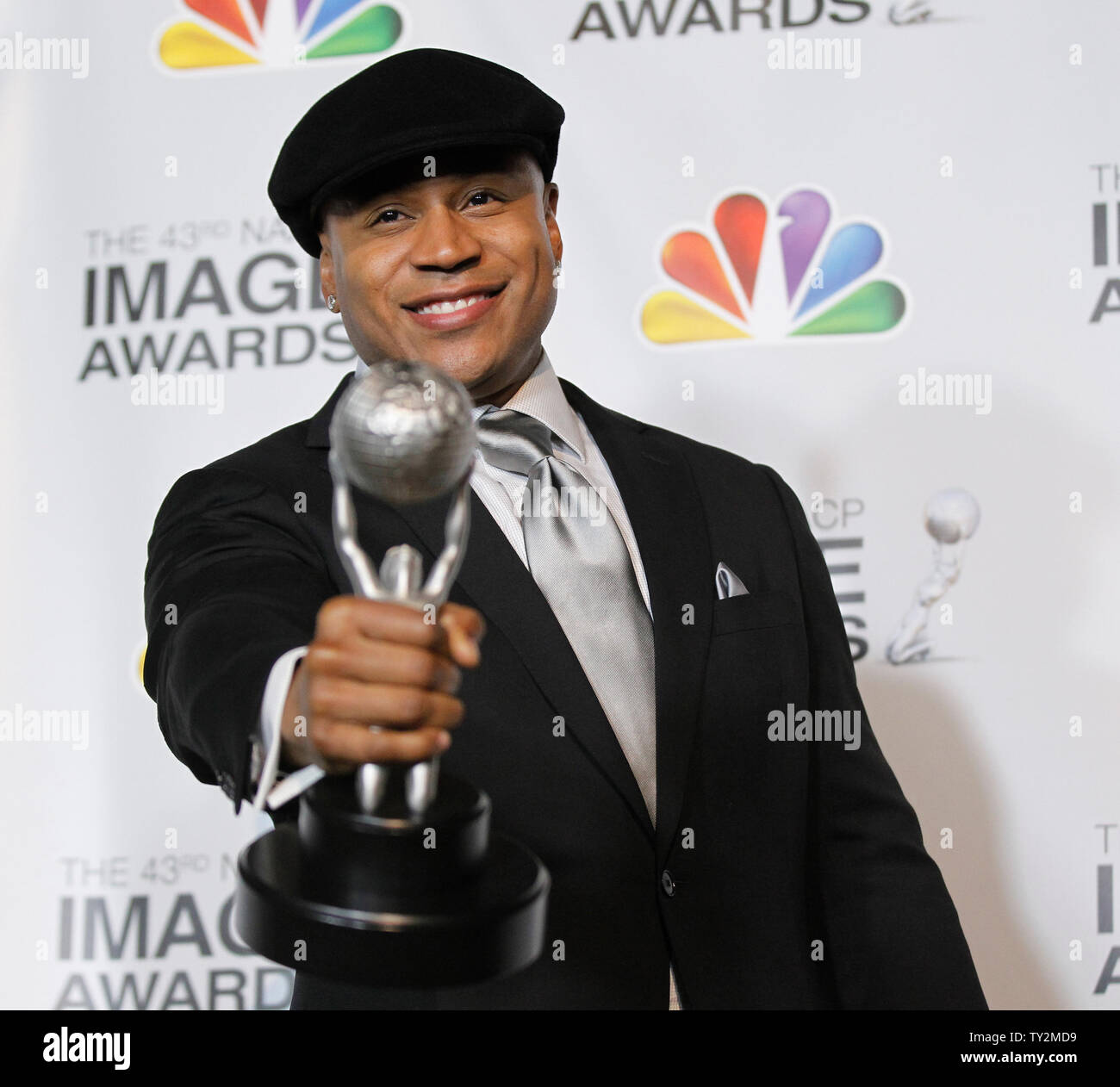 Actor LL Cool J holds his award for Outstanding Actor in a Drama Series for 'NCIS: Los Angeles' in the press room at the 43rd NAACP Image Awards at the Shrine Auditorium in Los Angeles on February 17, 2012.  UPI/Danny Moloshok Stock Photo