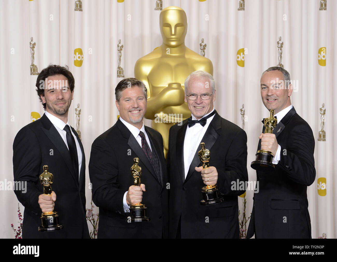 Bill Westenhofer, Guillaume Rocheron, Erik-Jan De Boer and Donald R. Elliott holds their Oscars for Achievement in Visual Effects for 'Life of Pie'  backstage at the 85th Academy Awards at the Hollywood and Highlands Center in the Hollywood section of Los Angeles on February 24, 2013. UPI/Phil McCarten Stock Photo