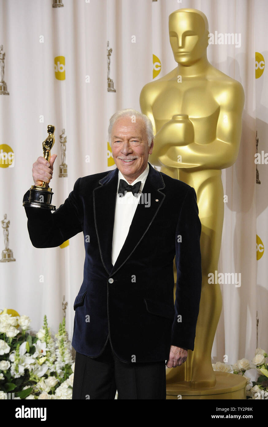 Christopher Plummer holds his Oscar for best Performance by an Actor in a Supporting Role for 'Beginners,' backstage during the 84th Academy Awards in the Hollywood section of Los Angeles on February 26, 2012. UPI/Phil McCarten Stock Photo
