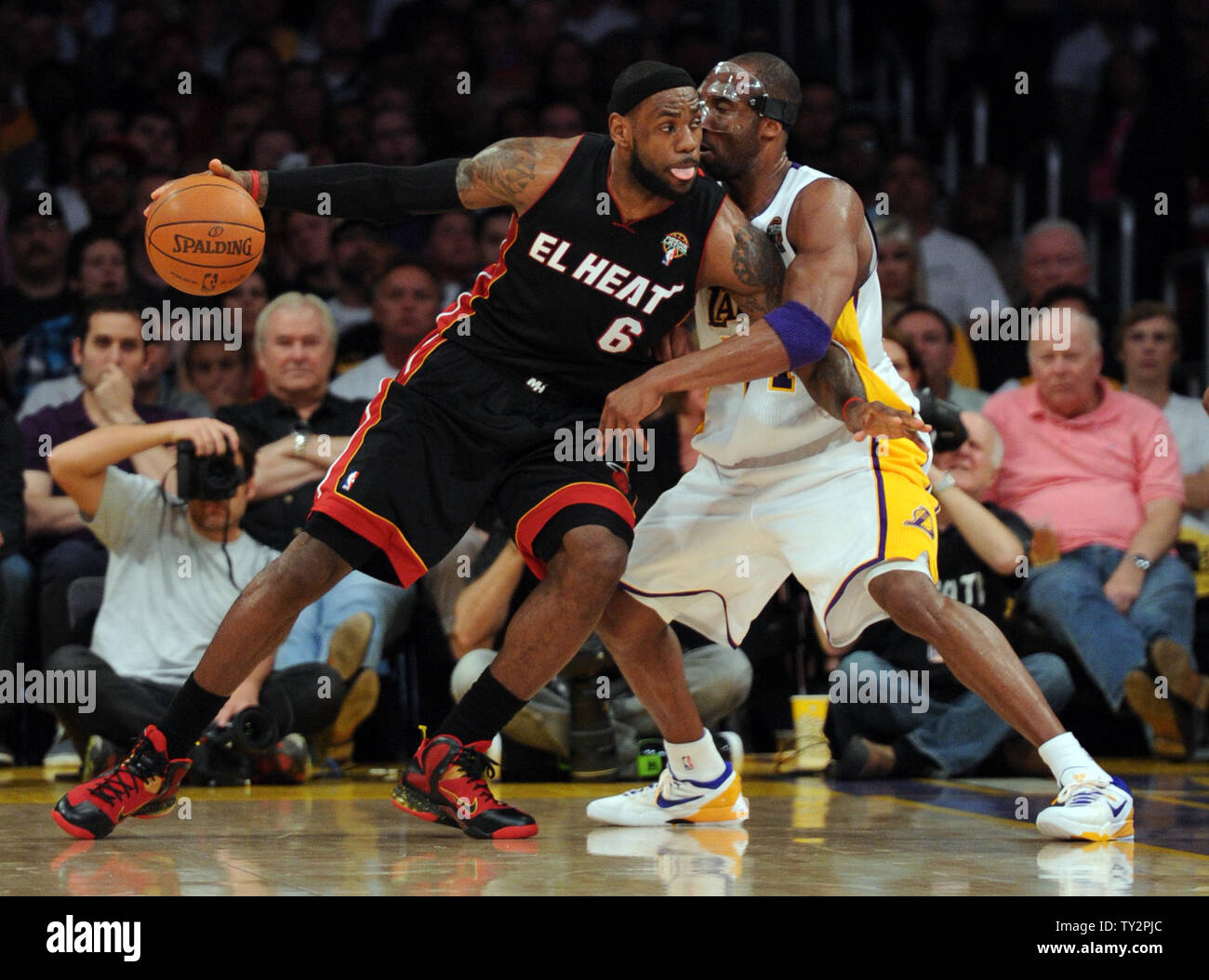 Los Angeles Lakers shooting guard Kobe Bryant (24) plays tight defense on Miami Heat small forward LeBron James (6) in the first half of  their NBA basketball game in Los Angeles on March 4, 2012.    UPI/Lori Shepler Stock Photo