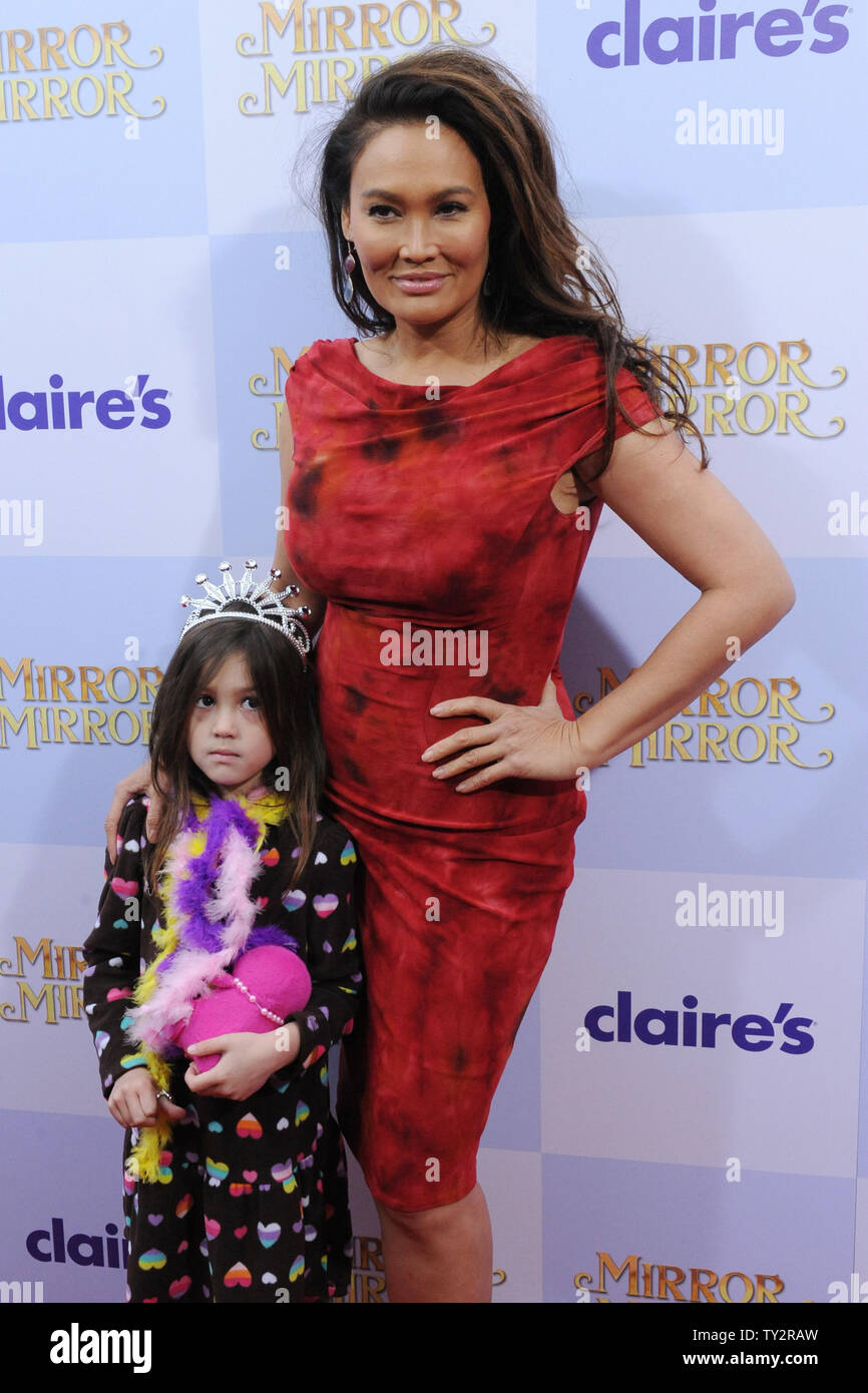 Actress Tia Carrere and her daughter Bianca attend the premiere of the motion picture comedy fantasy 'Mirror Mirror', at Grauman's Chinese Theatre in the Hollywood section of Los Angeles on March 17, 2012.  UPI/Jim Ruymen Stock Photo