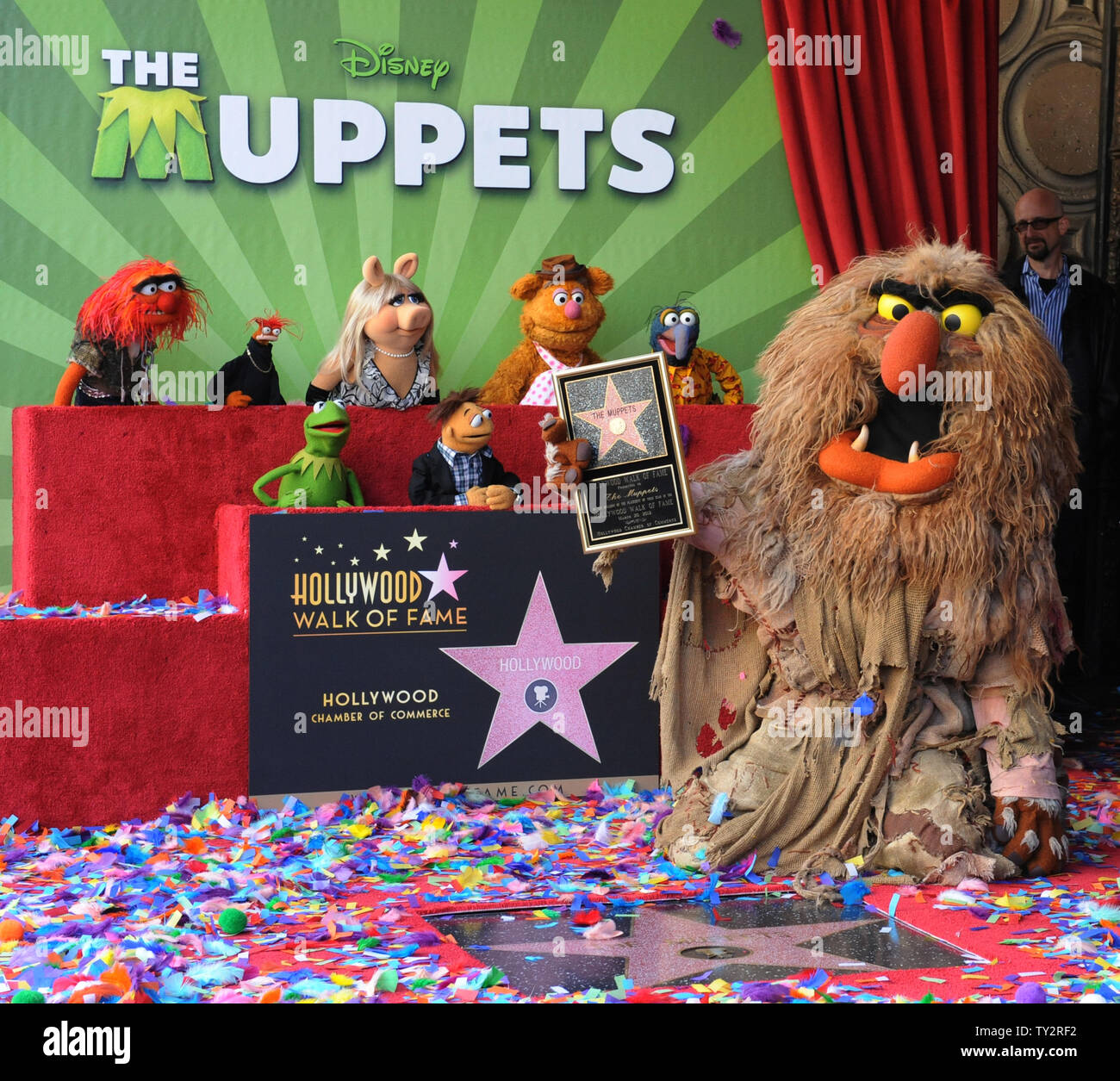 Muppets Animal, Pepe, Miss Piggy, Fozzie, Gonzo, (L-R, rear) and Kermit, Walter and Sweetums attend the Inimitable Muppets unveiling ceremony honoring The Muppets  with the 2,466th star on the Hollywood Walk of Fame in Los Angeles on March 20, 2012. UPI/Jim Ruymen Stock Photo
