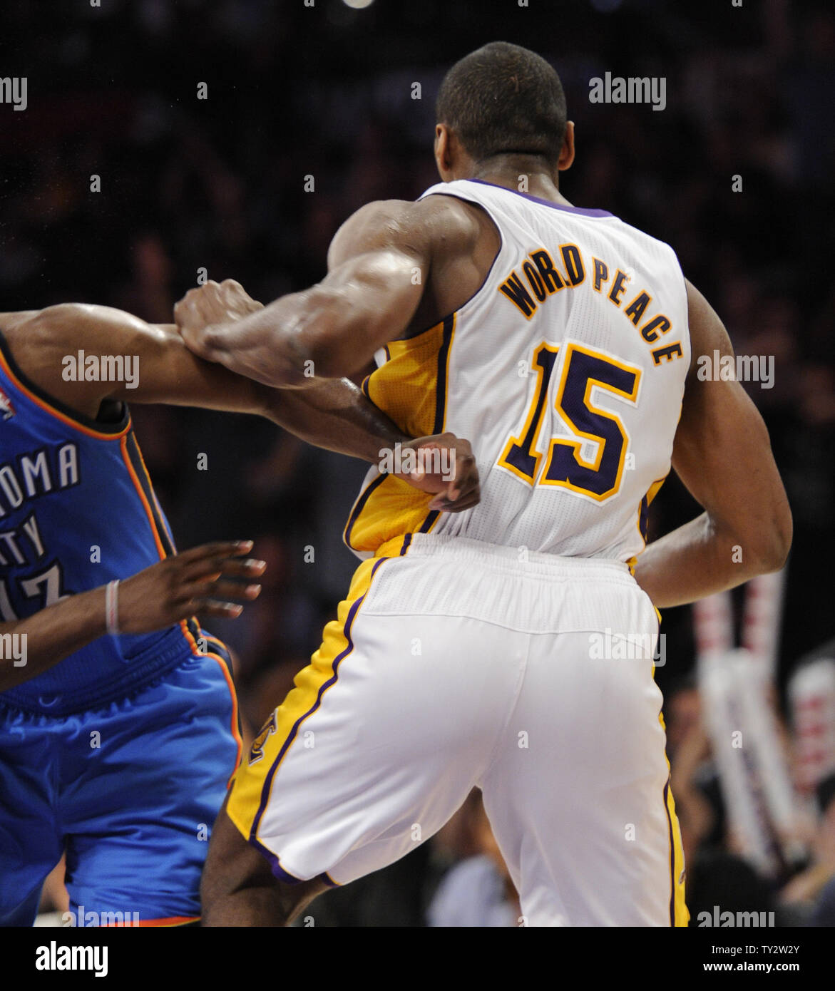 Los Angeles Lakers small forward Metta World Peace, right, works