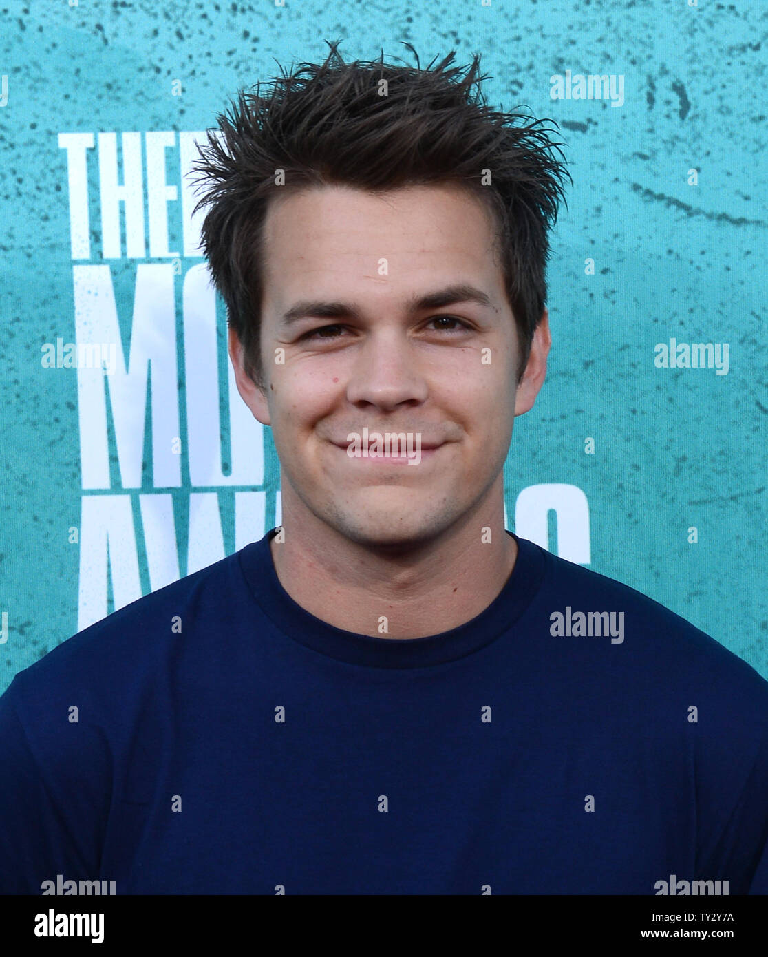 Actor Johnny Simmons arrives at the MTV Movie Awards at the Gibson Amphitheatre in Universal