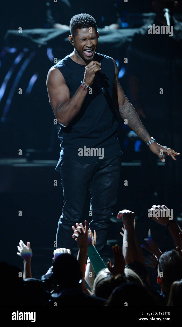 Singer Usher performs during BET Awards 12, at the Shrine Auditorium in