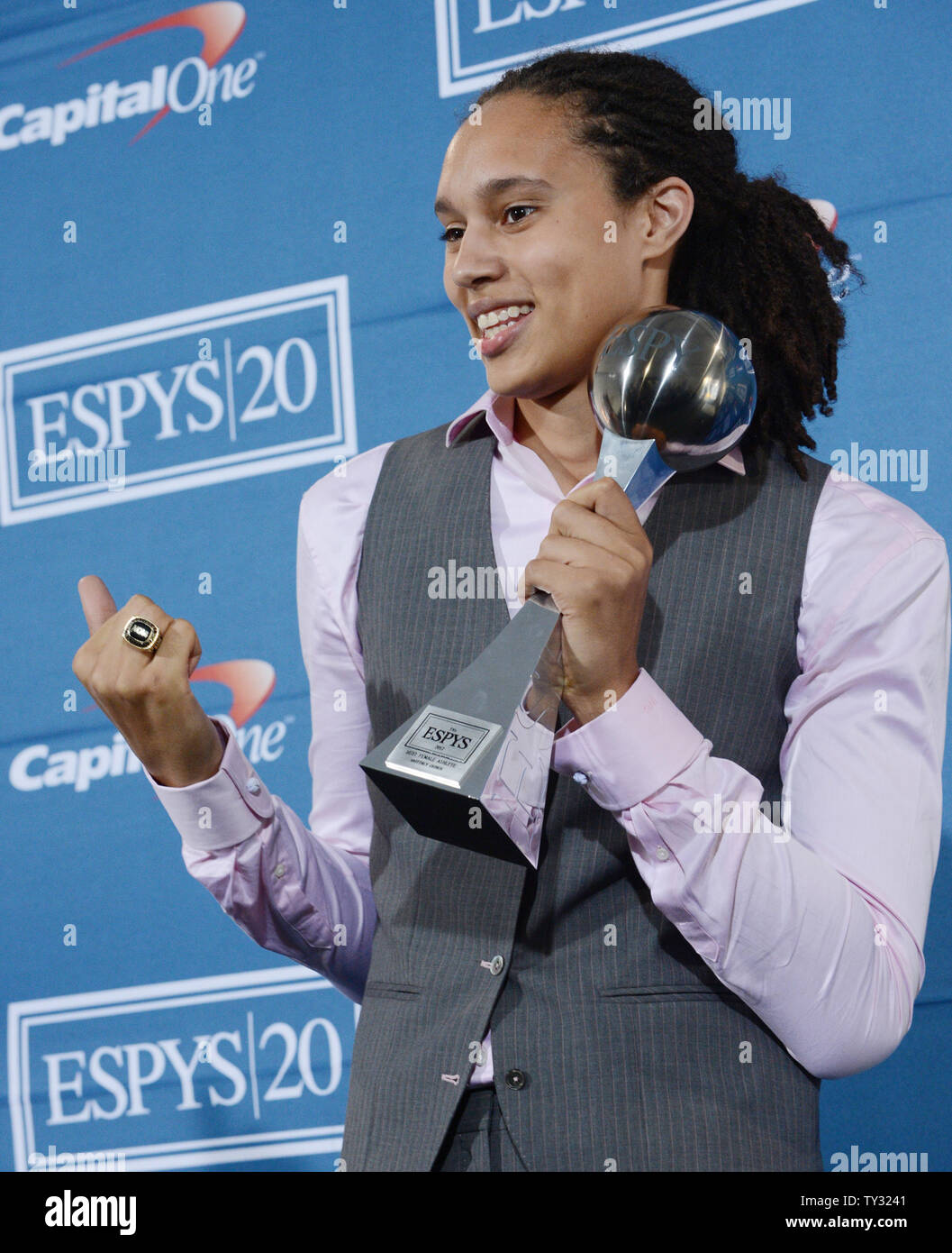 American women's college basketball player Brittney Griner appears backstage with her award that
