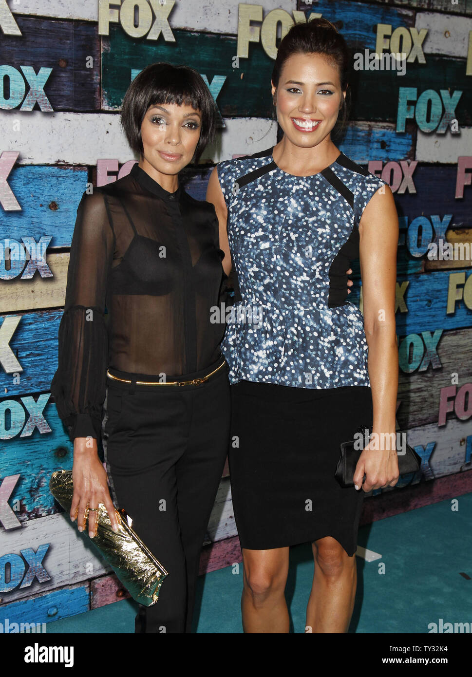 Actresses Tamara Taylor (L) and Michaela Conlin (R) attend the Fox All-Star Party in Los Angeles on July 23, 2012.  UPI/Danny Moloshok Stock Photo