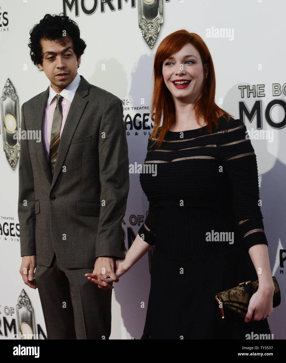 Christina Hendricks And Her Husband Geoffrey Arend Attend The Premiere Of The Book Of Mormon