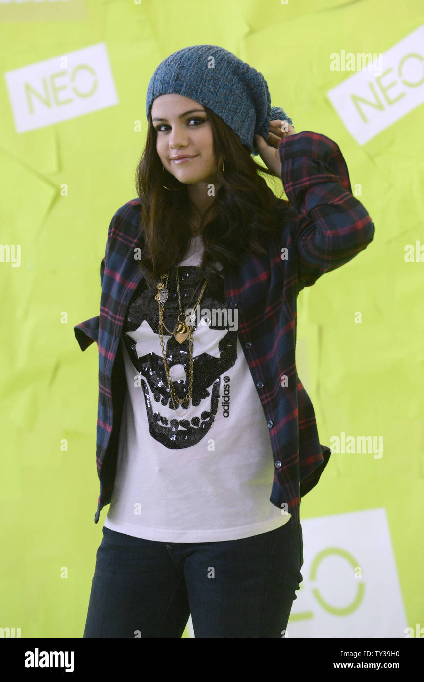 Selena Gomez poses for photographers during a promotion of her partnership  with the Adidas NEO clothing label in Los Angeles on November 20, 2012.  UPI/ Phil McCarten Stock Photo - Alamy