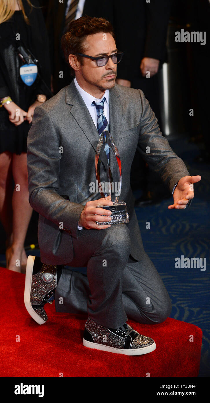 Actor Robert Downey, Jr. appears backstage with his Favorite Movie Actor  award during the 39th annual People's Choice Awards at Nokia Theatre L.A.  Live in Los Angeles on January 9, 2013. UPI/Jim