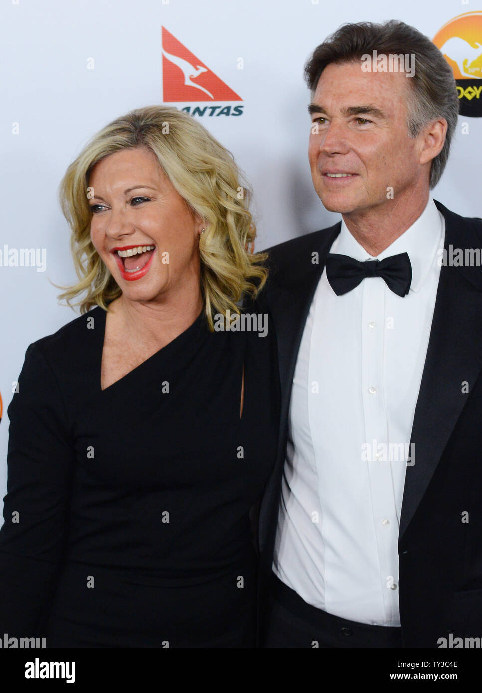 Actress Olivia Newton-John and her husband John Easterling attend the G'Day USA Los Angeles gala at JW Marriott in Los Angeles on January 12, 2013.  UPI/Jim Ruymen Stock Photo