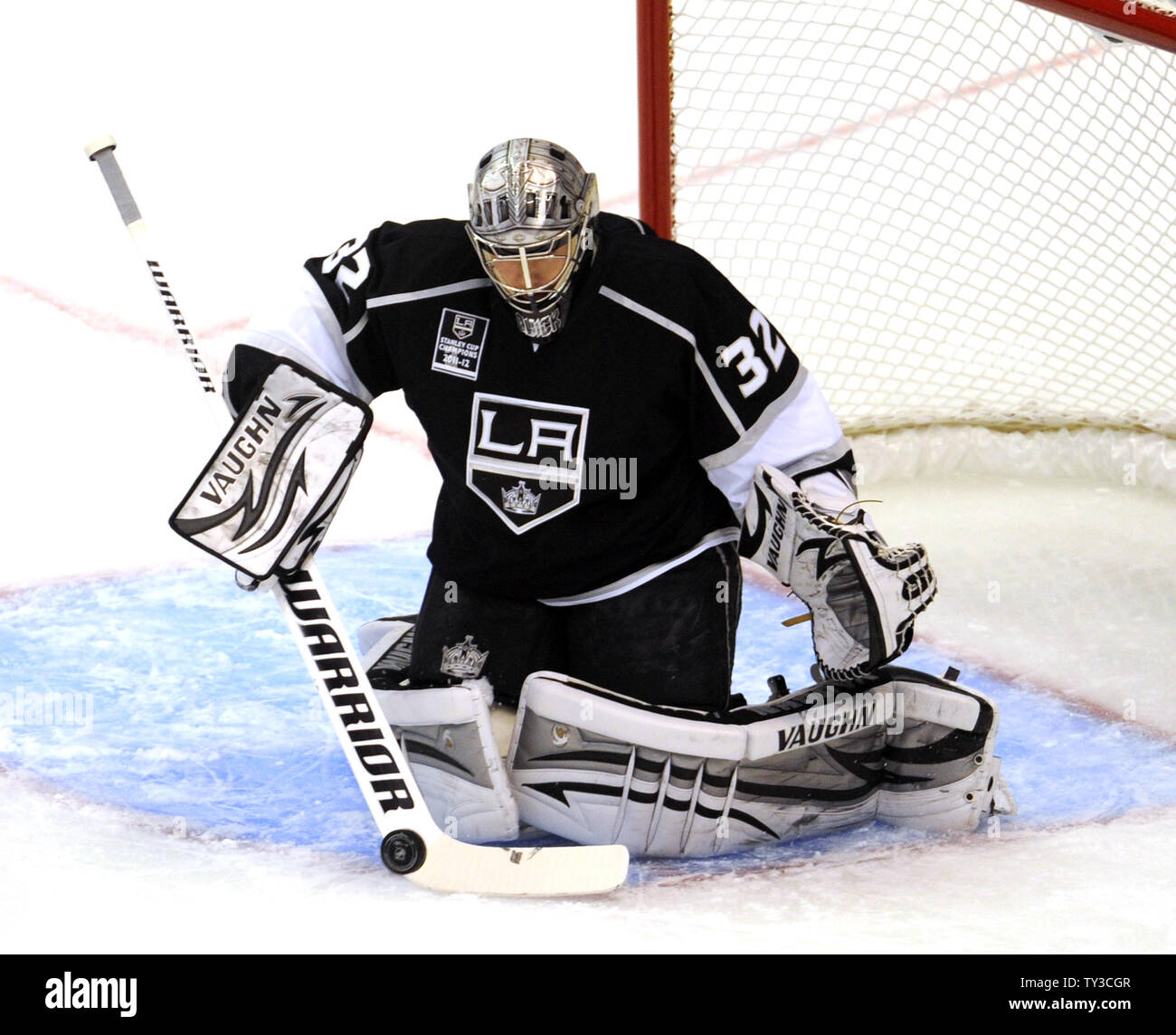 Los Angeles Kings goalie Jonathan Quick (32) stops a shot by the Chicago Blackhawks in the first period at Staples Center in Los Angeles, California on January 19, 2013.  UPI/Lori Shepler. Stock Photo